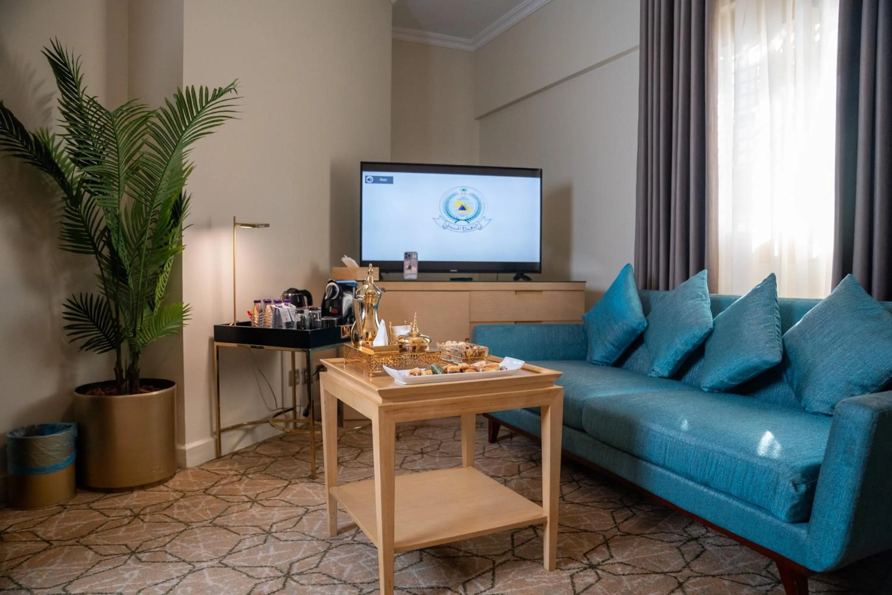 Living room in SAJA By Warwick Madinah Hotel