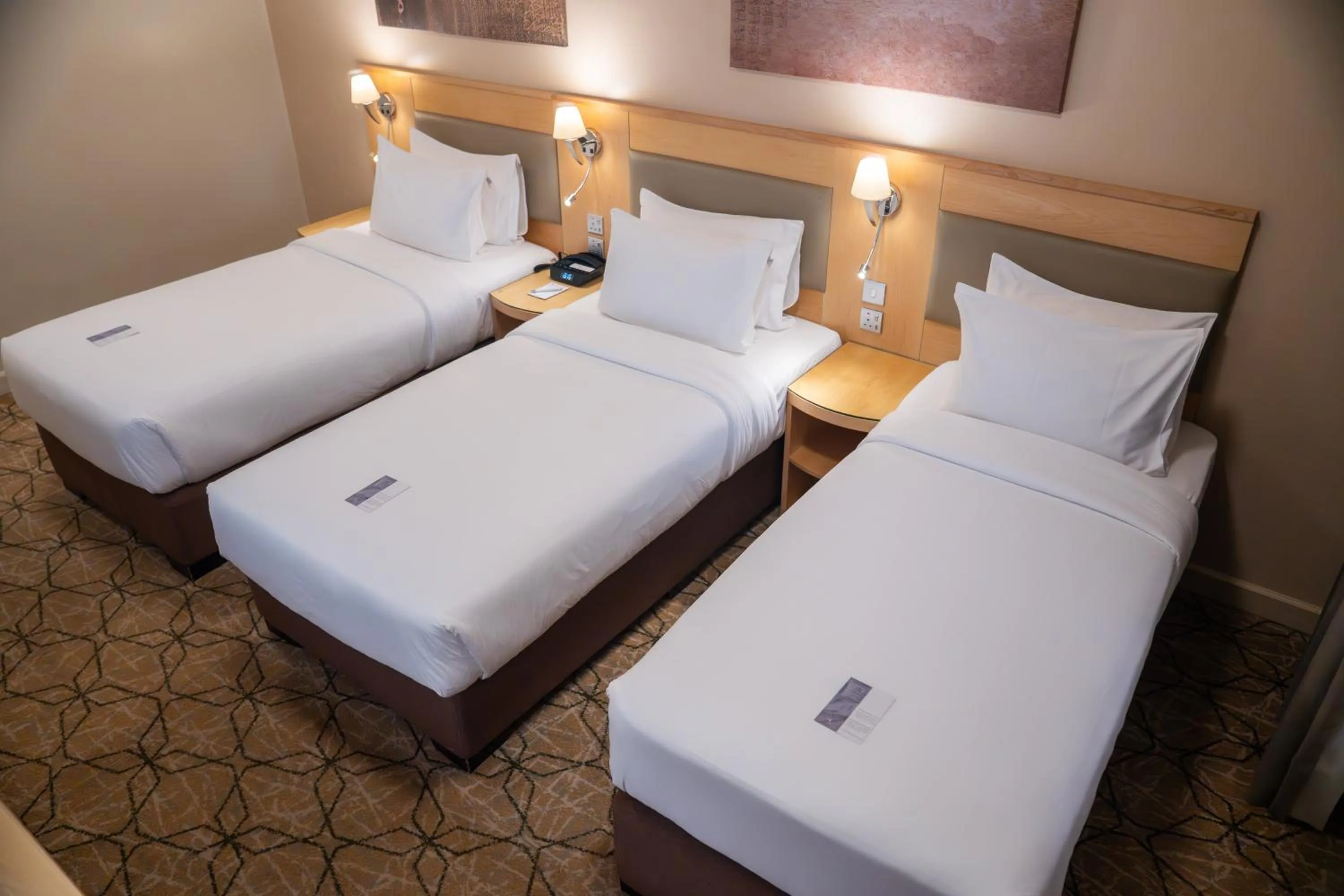 Bed in SAJA By Warwick Madinah Hotel