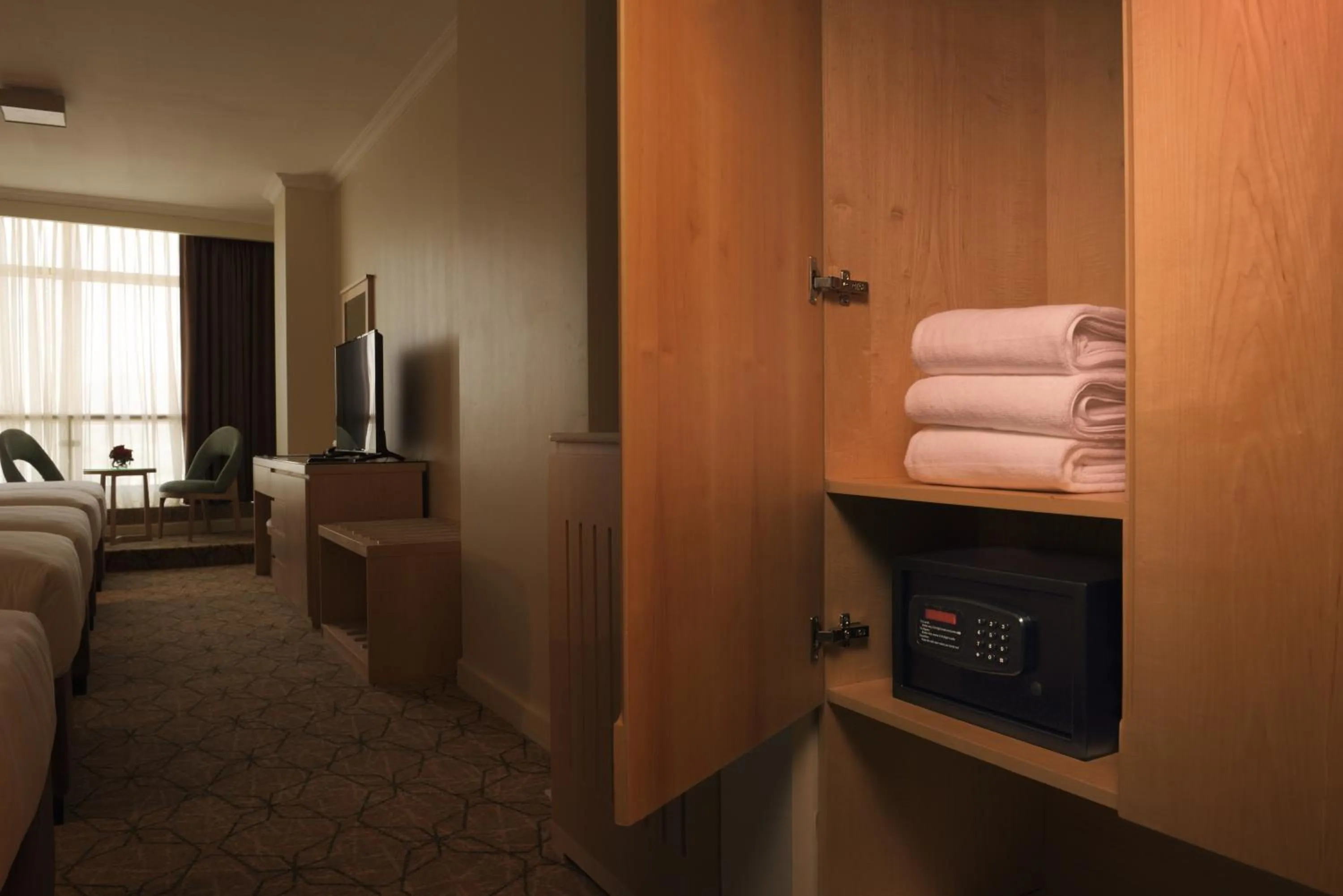 TV and multimedia, Bed in SAJA By Warwick Madinah Hotel