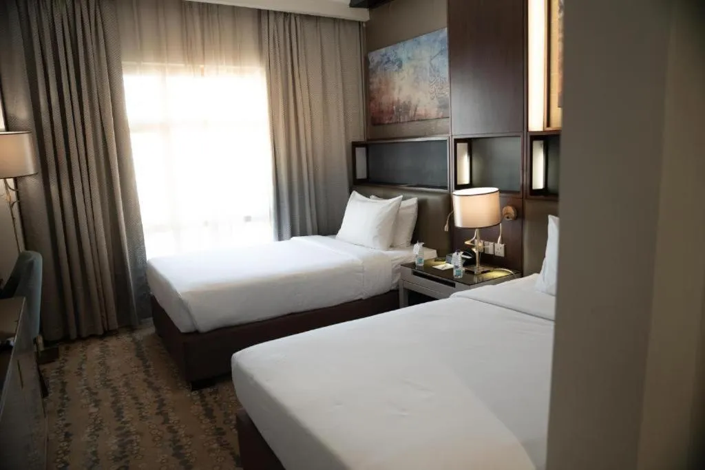 Bed in SAJA By Warwick Madinah Hotel