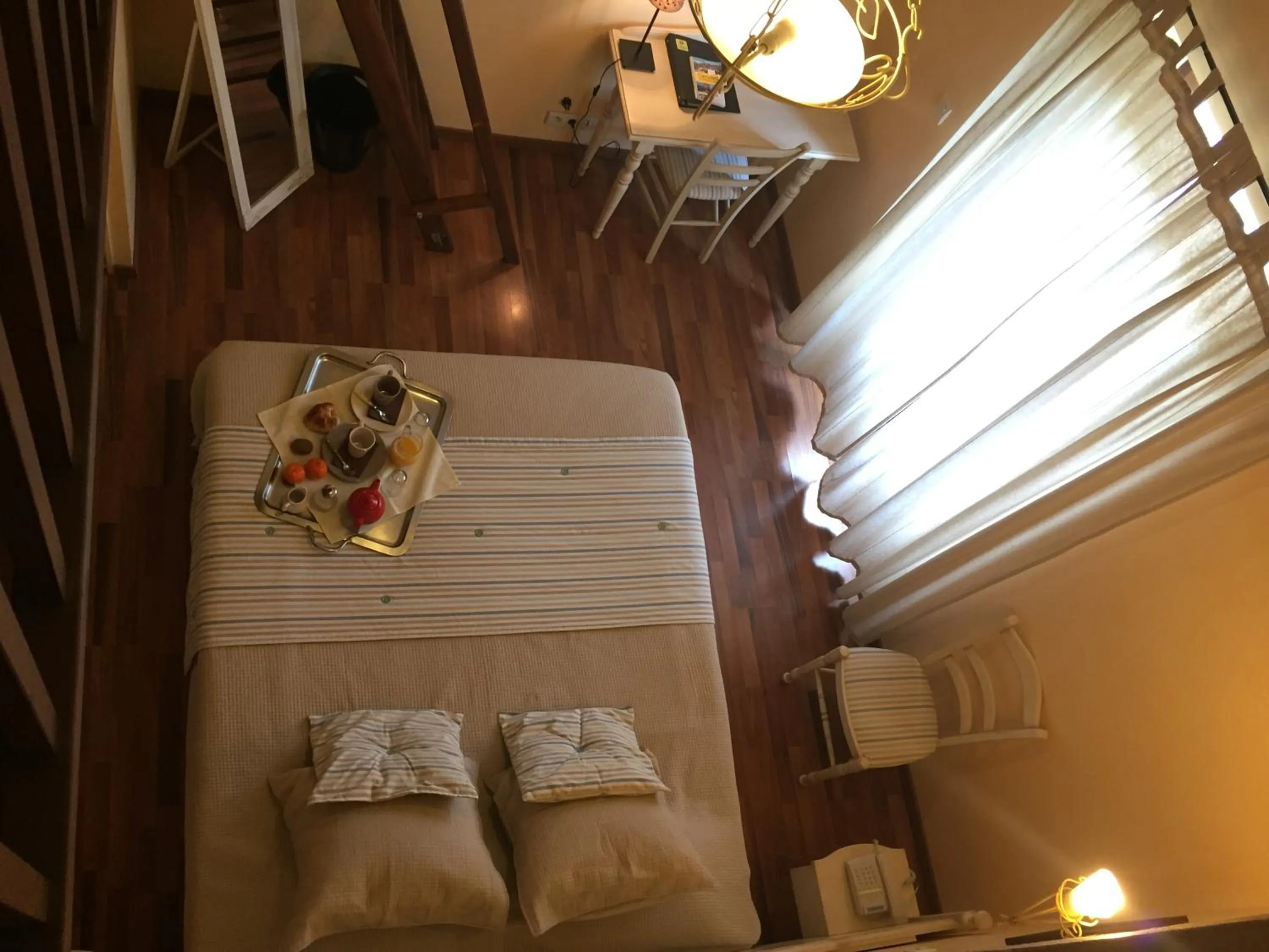 Bed in Logis Hôtel Les 3B