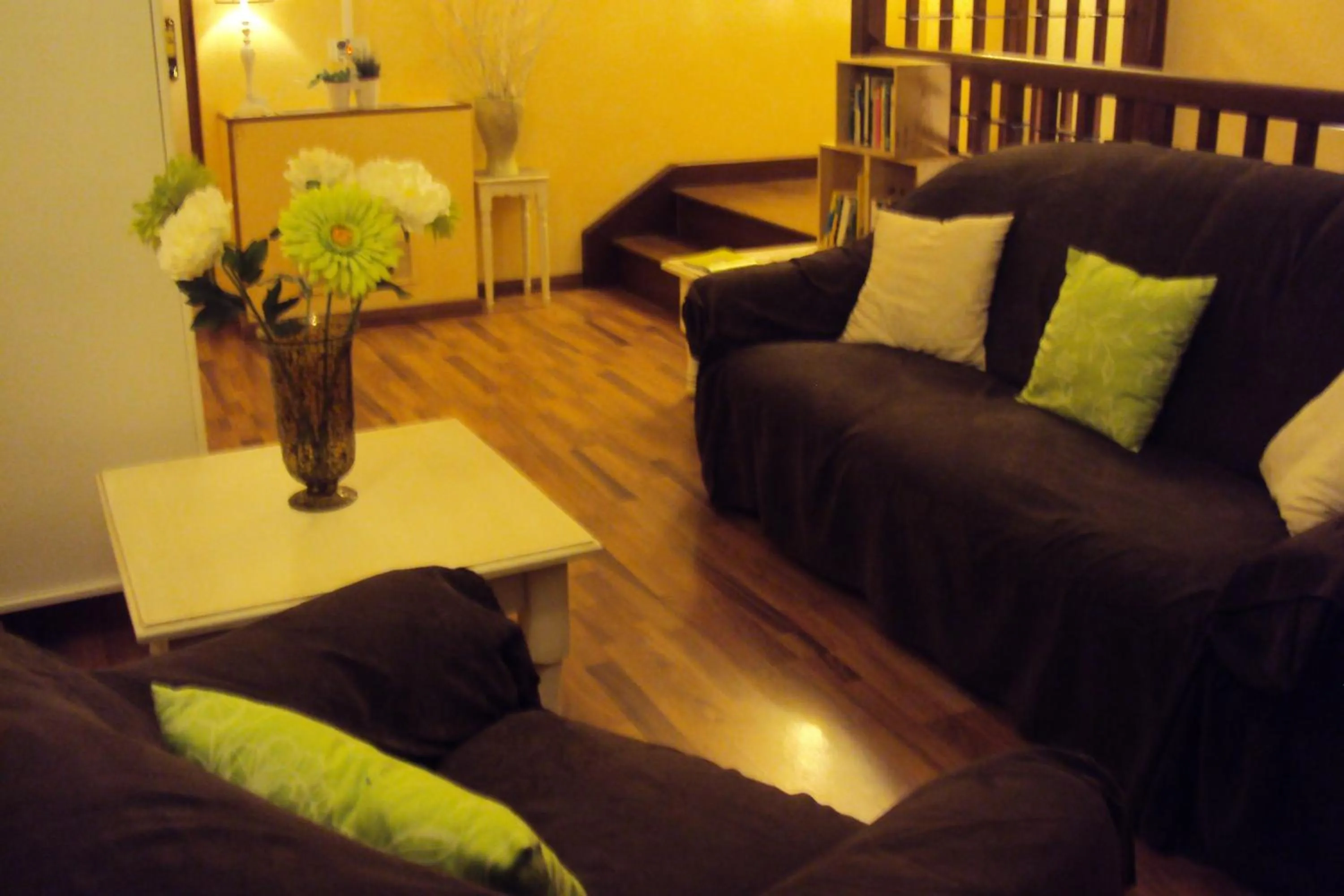 Communal lounge/ TV room in Logis Hôtel Les 3B