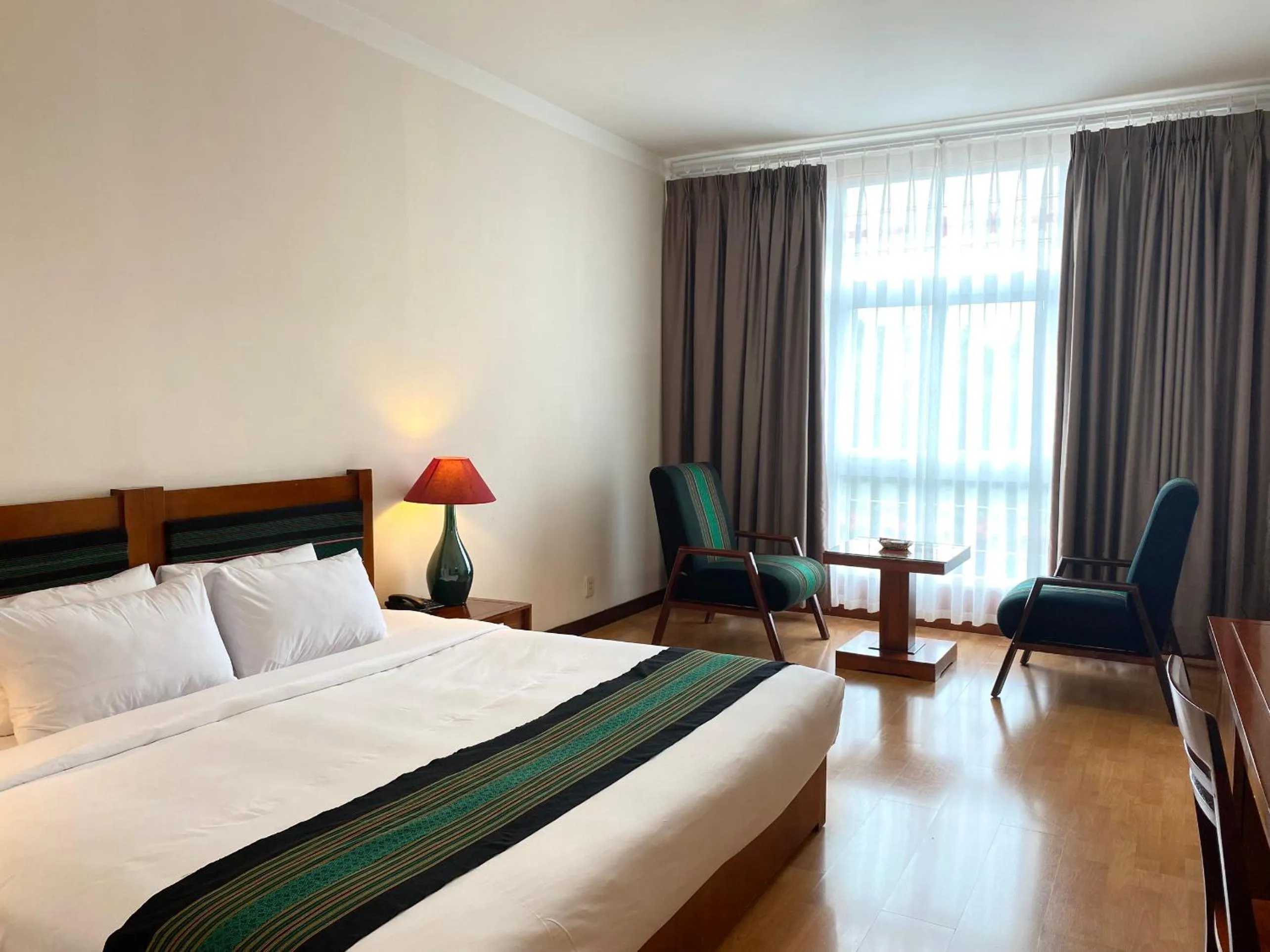 Bed in Dam San Hotel