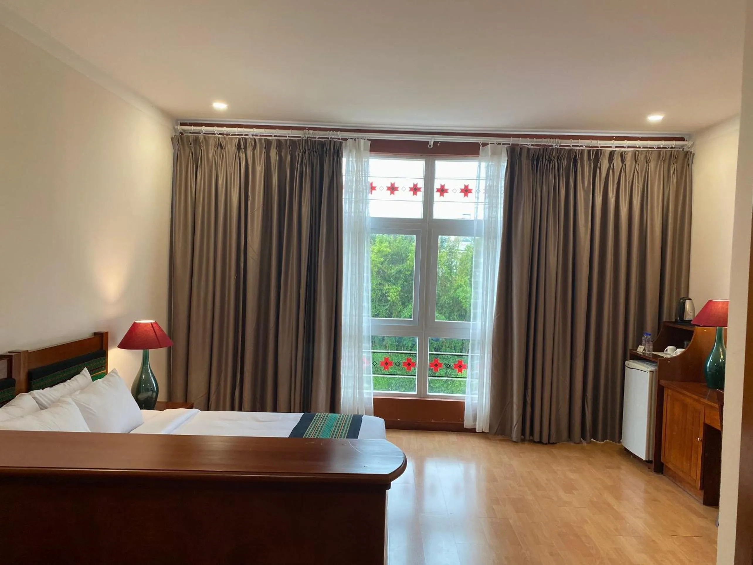 Bed in Dam San Hotel