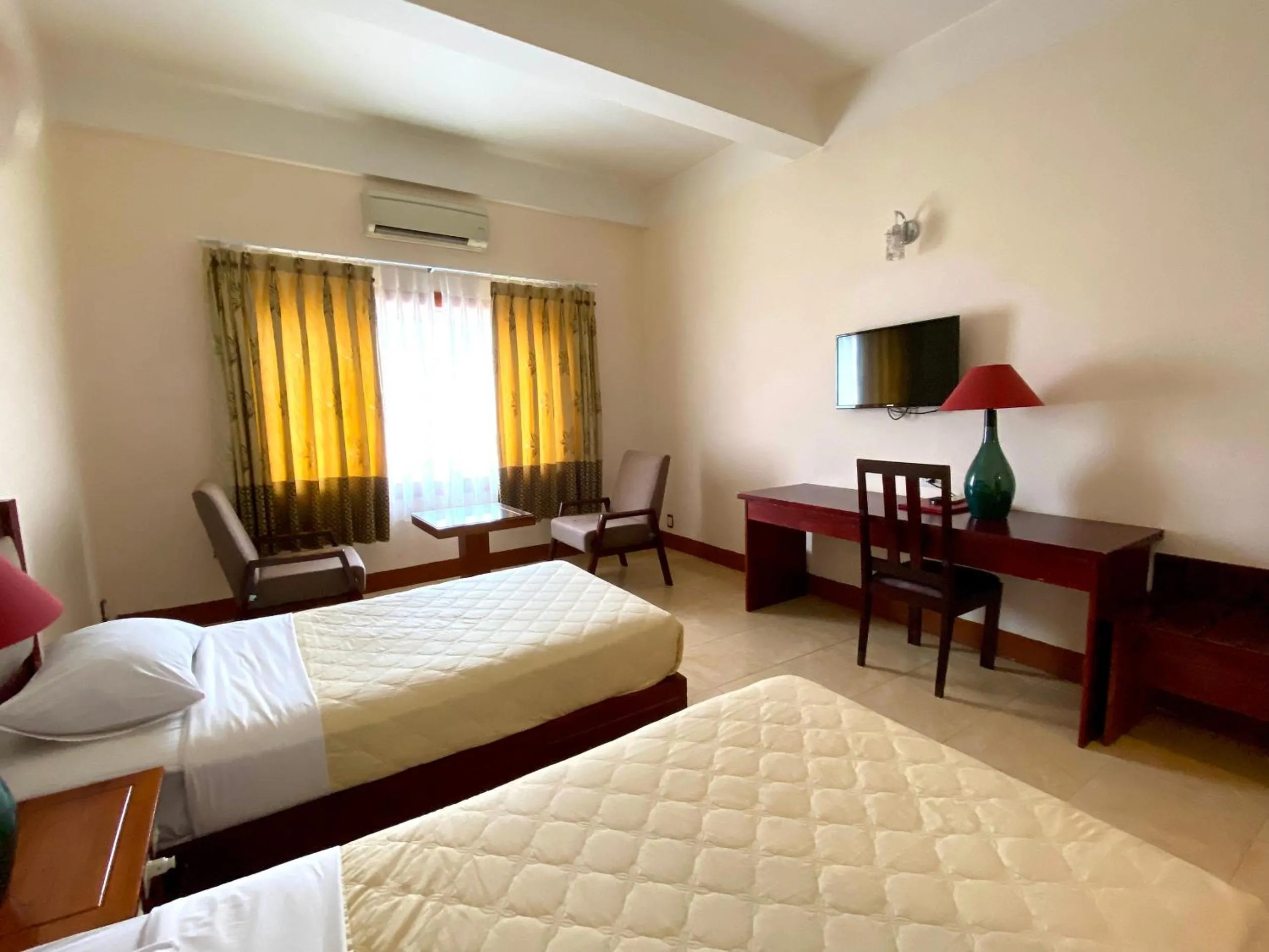 Bed in Dam San Hotel