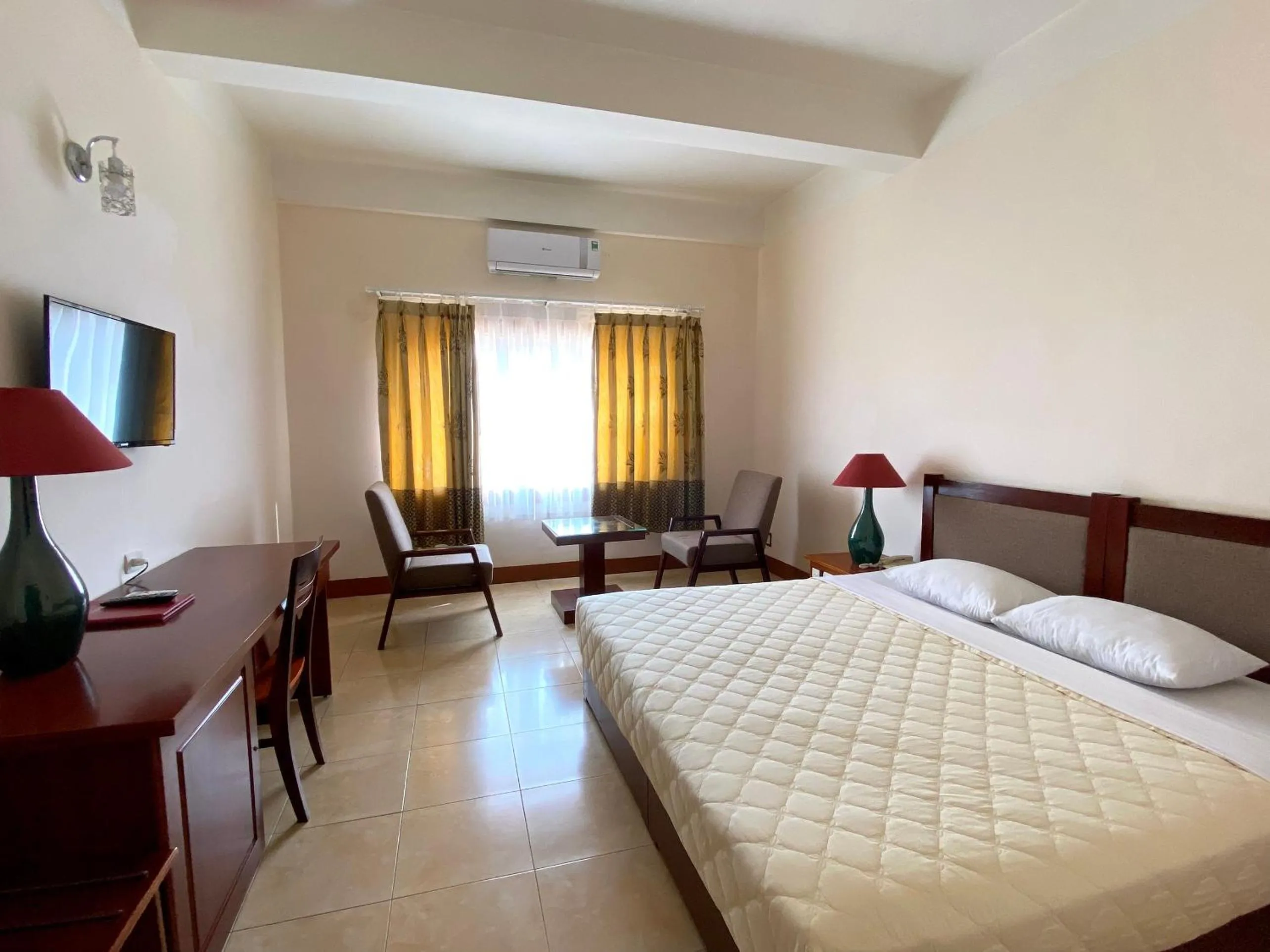 Bed in Dam San Hotel