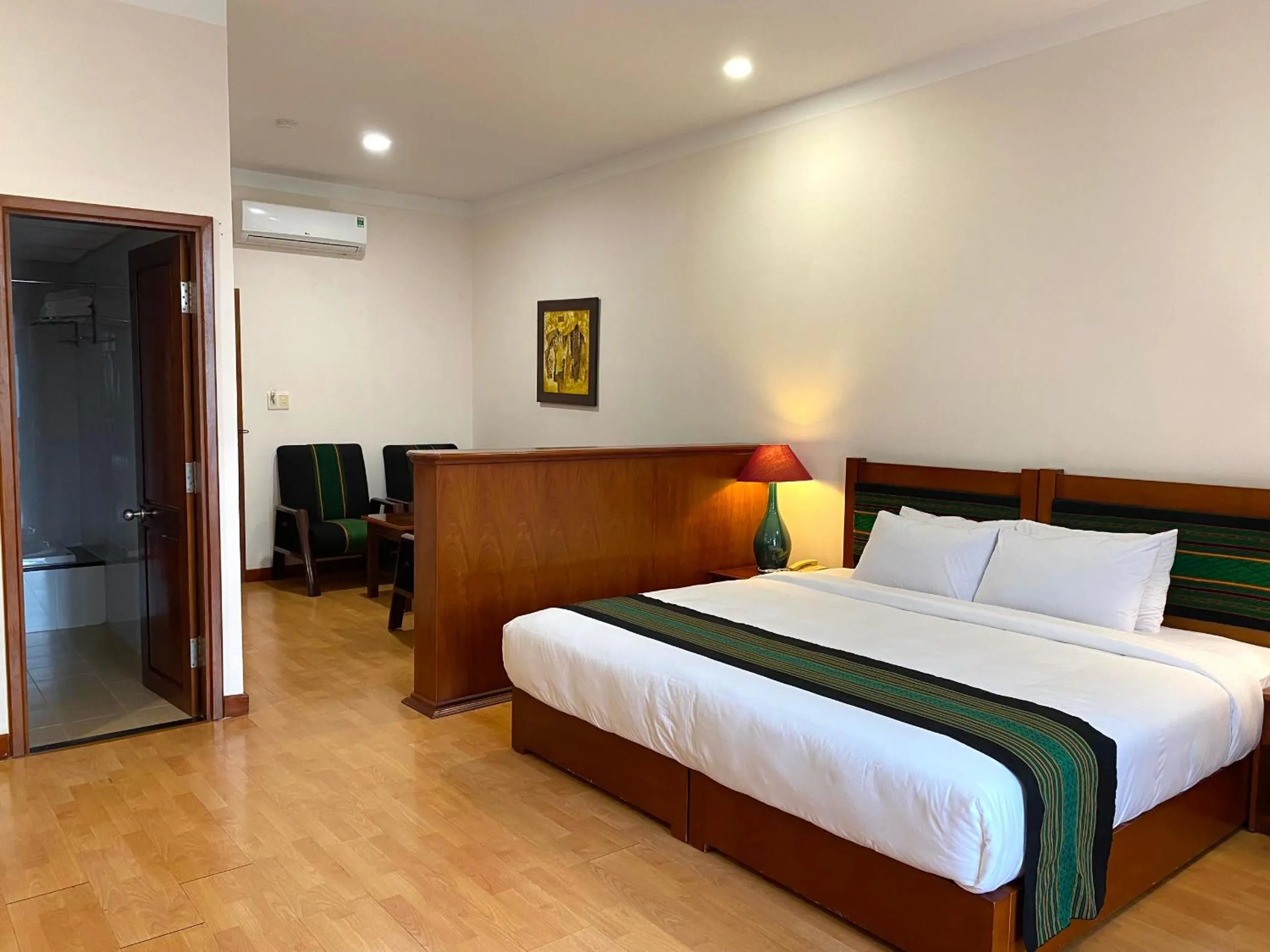 Bed in Dam San Hotel