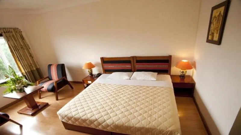 Bed in Dam San Hotel