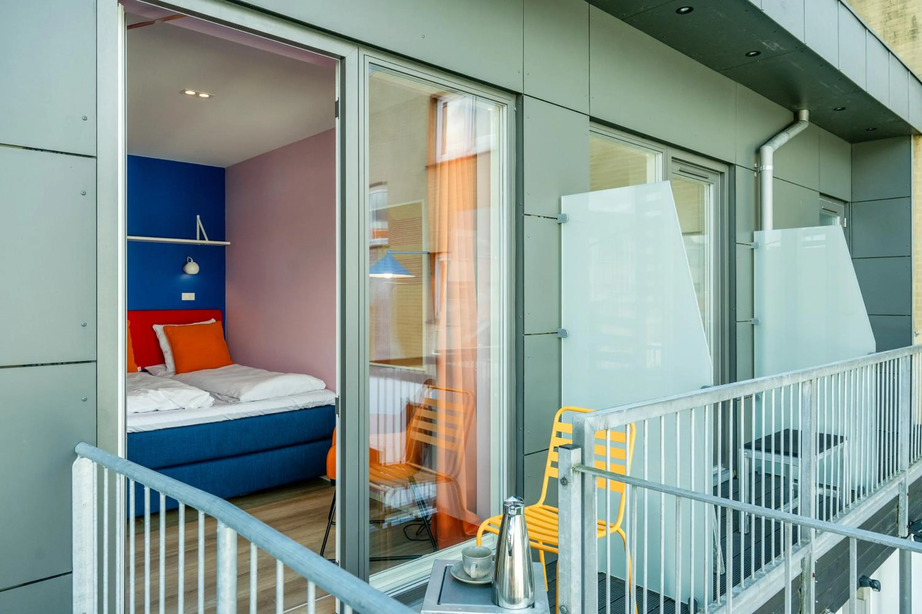 Balcony/Terrace, Bed in Hotel Skjern