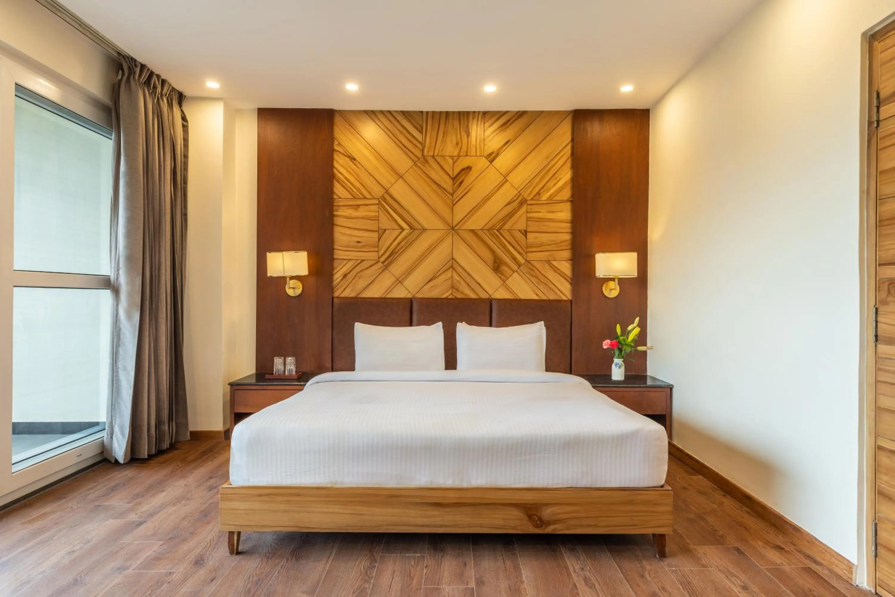 Bedroom, Bed in Country Inn Premier Pacific Mall Road Mussoorie
