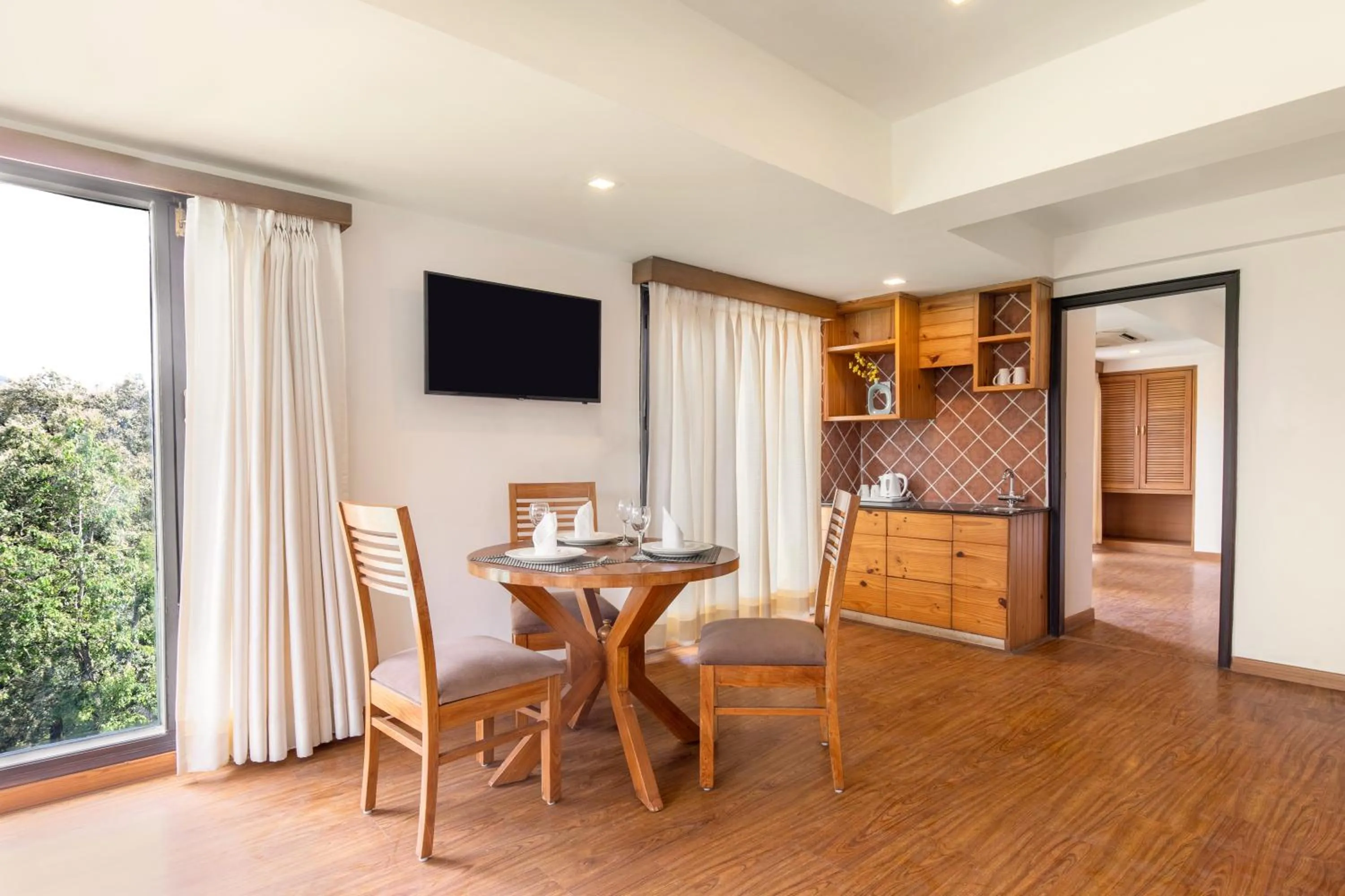 Living room in Country Inn Premier Pacific Mall Road Mussoorie