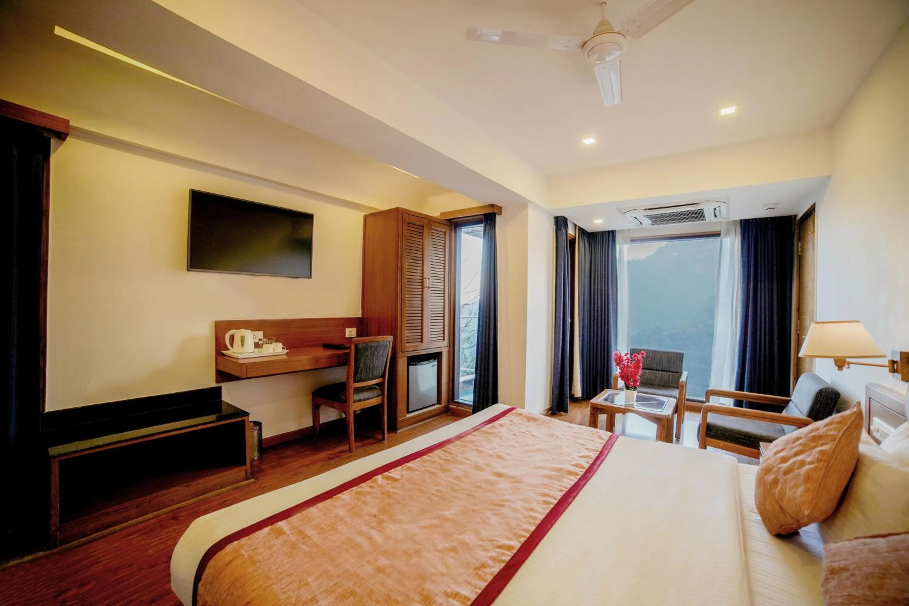 Communal lounge/ TV room, Bed in Country Inn Premier Pacific Mall Road Mussoorie