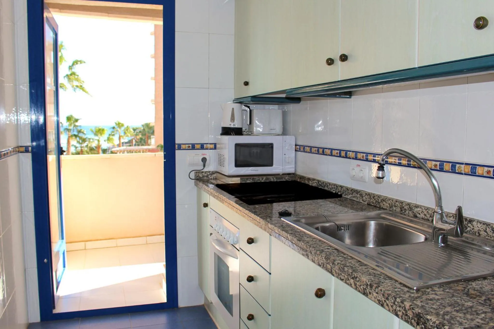 Kitchen or kitchenette in Turquesa Beach Unitursa