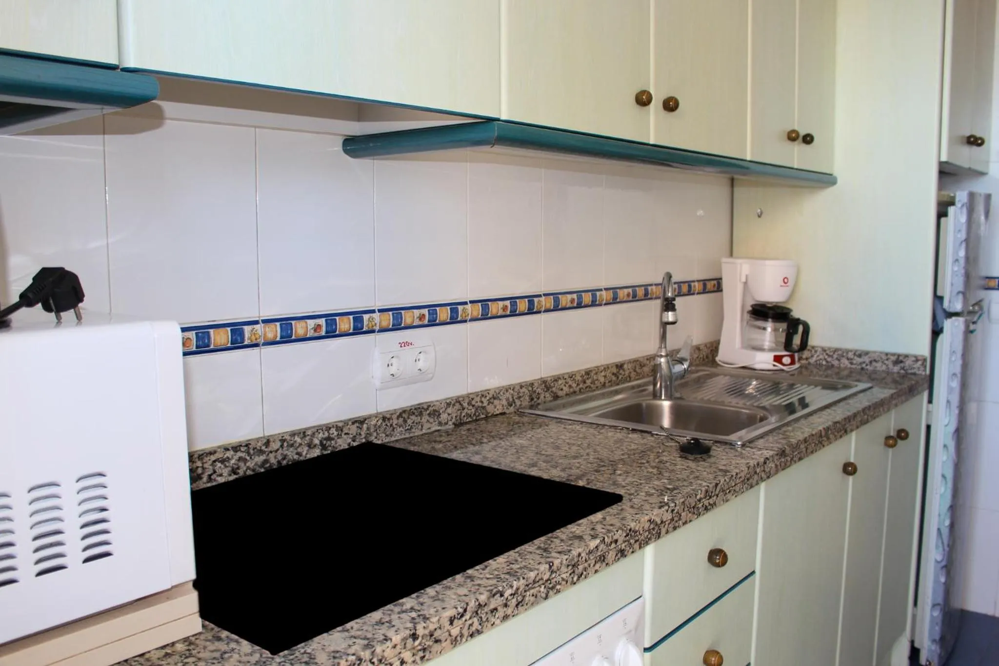 Kitchen or kitchenette in Turquesa Beach Unitursa