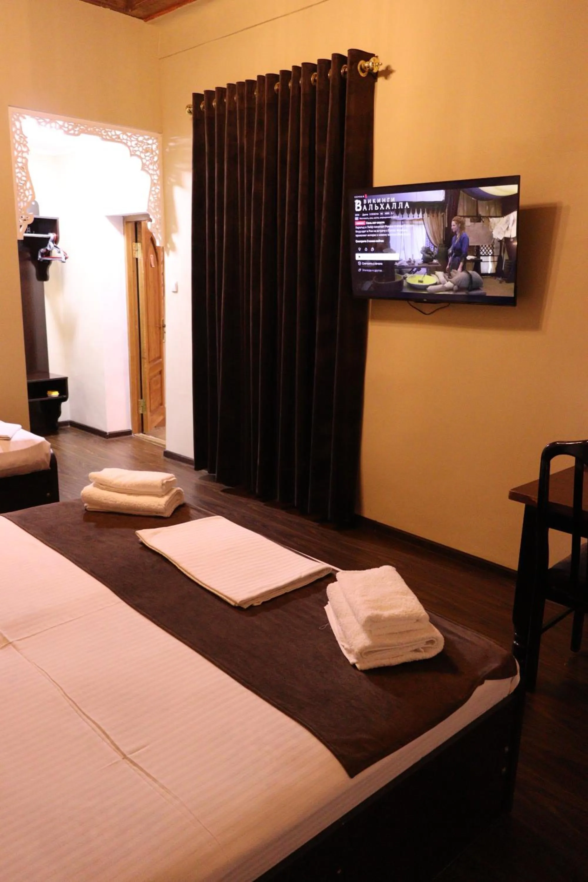 Photo of the whole room, Bed in Al Bukhari Boutique Hotel