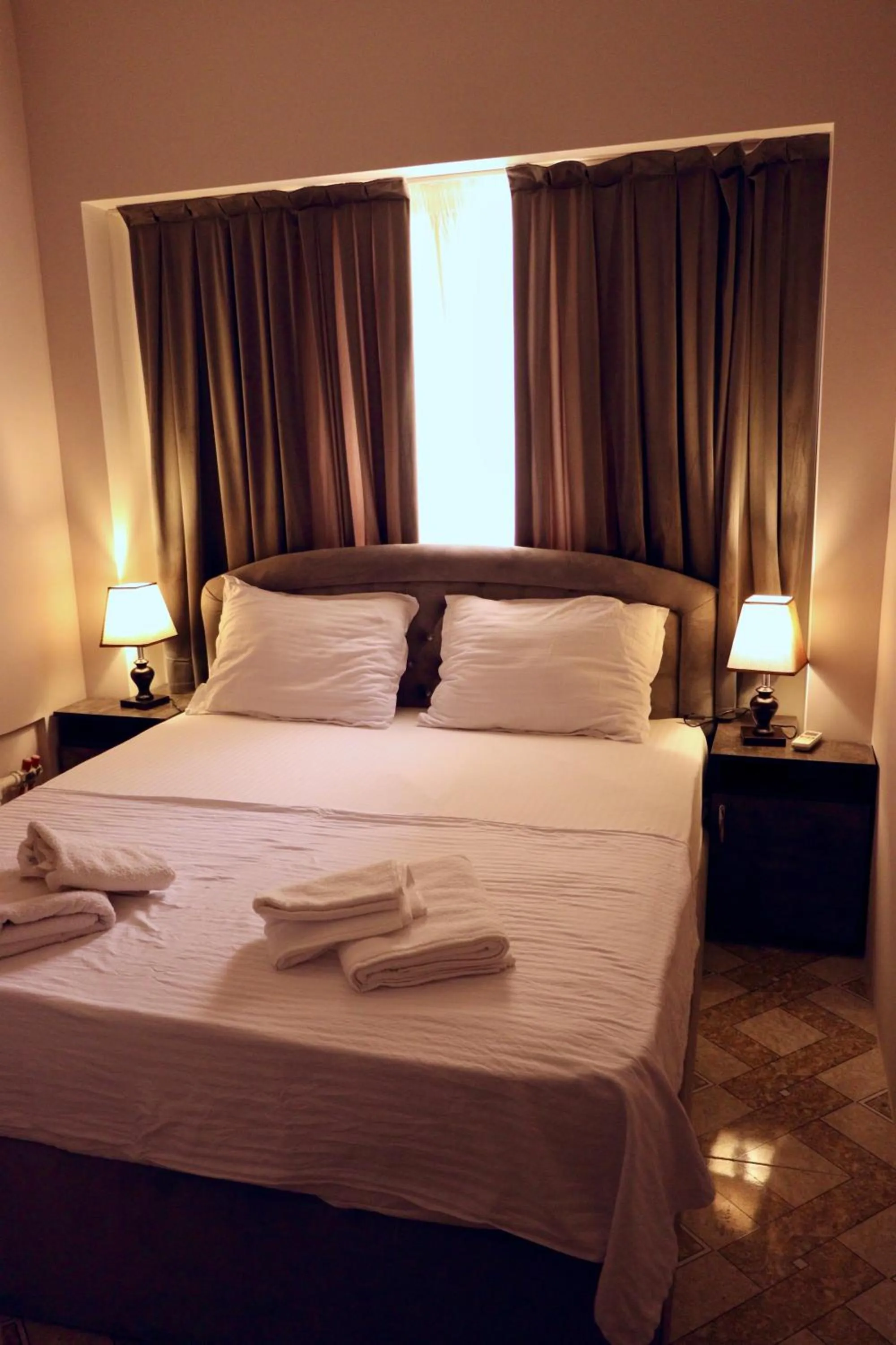 Bed in Al Bukhari Boutique Hotel