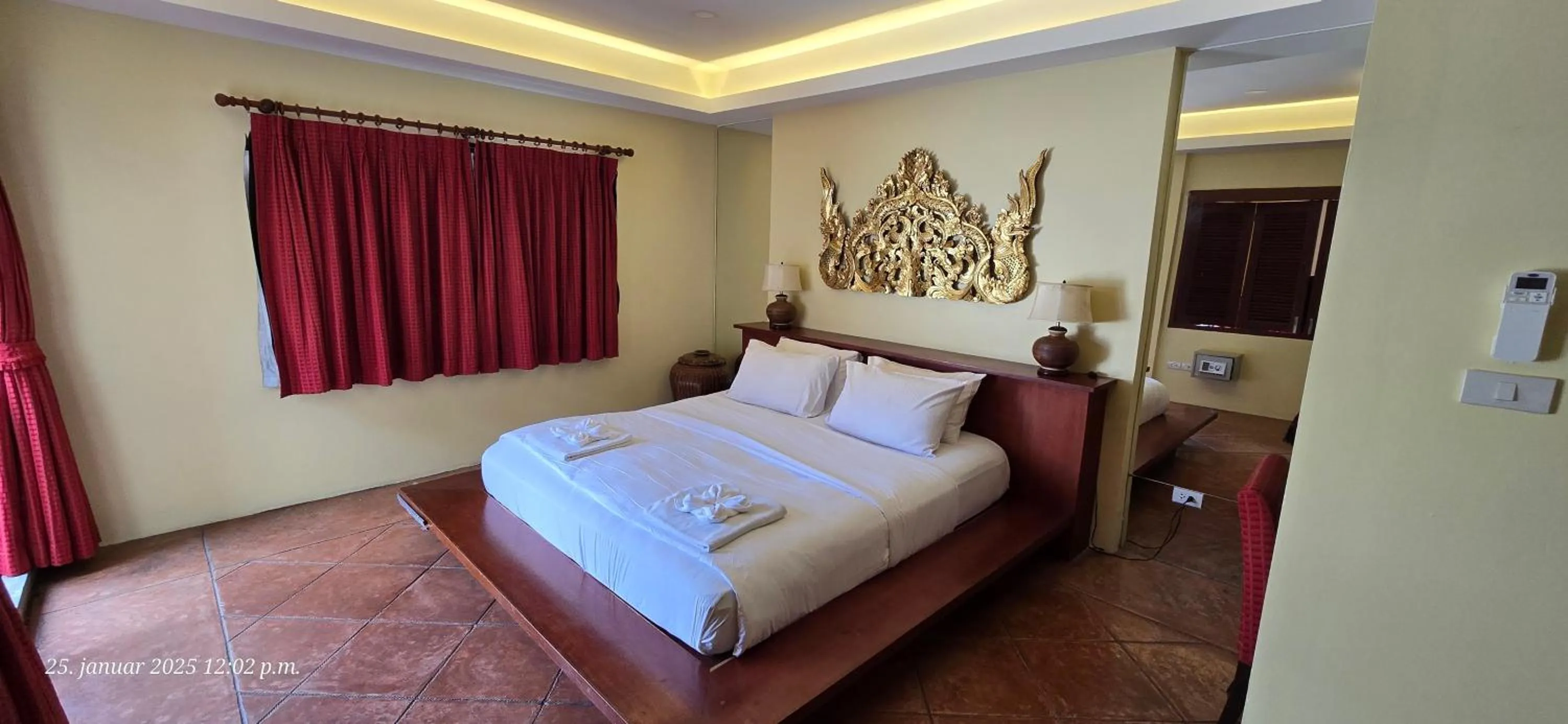 Bed in Nirvana Boutique Suites