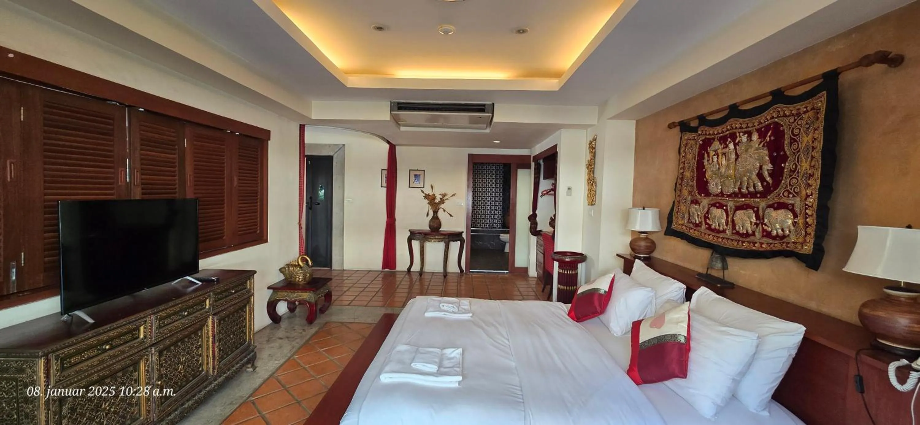 Bed in Nirvana Boutique Suites