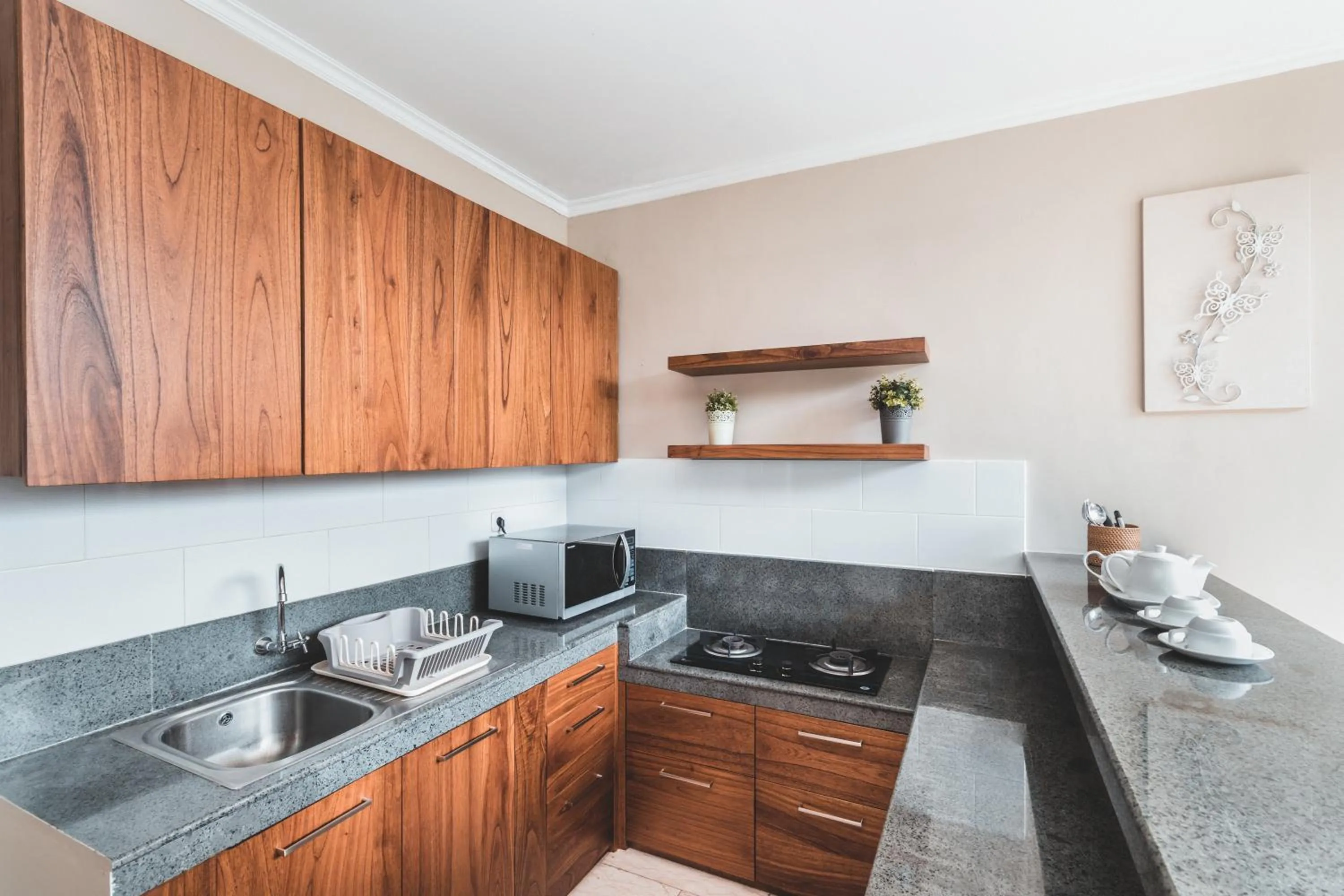 Kitchen or kitchenette in Dura Villas Bali at Kerobokan