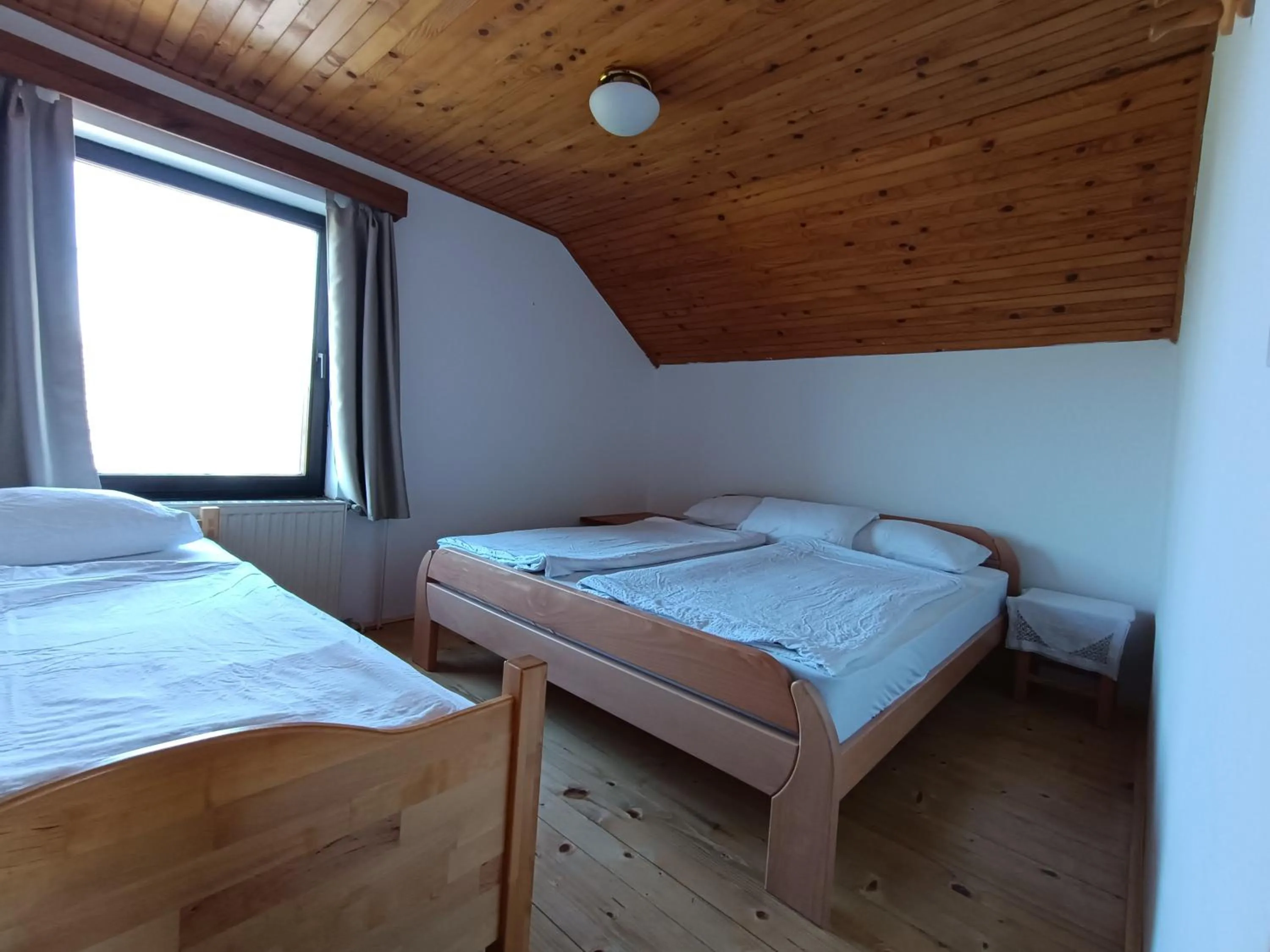 Photo of the whole room, Bed in Tourist Farm Strle With Great Local Food