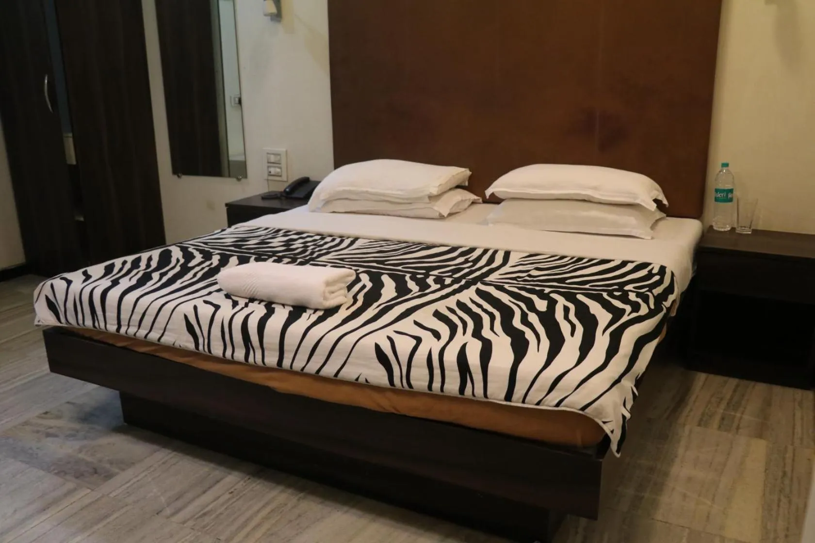 Bed in Hotel Milan International