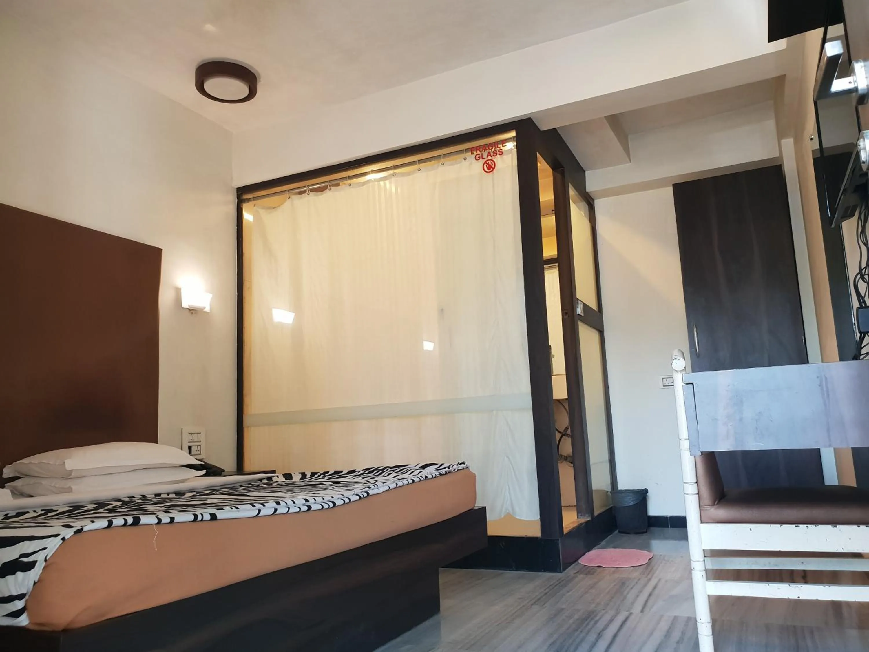 Bed in Hotel Milan International