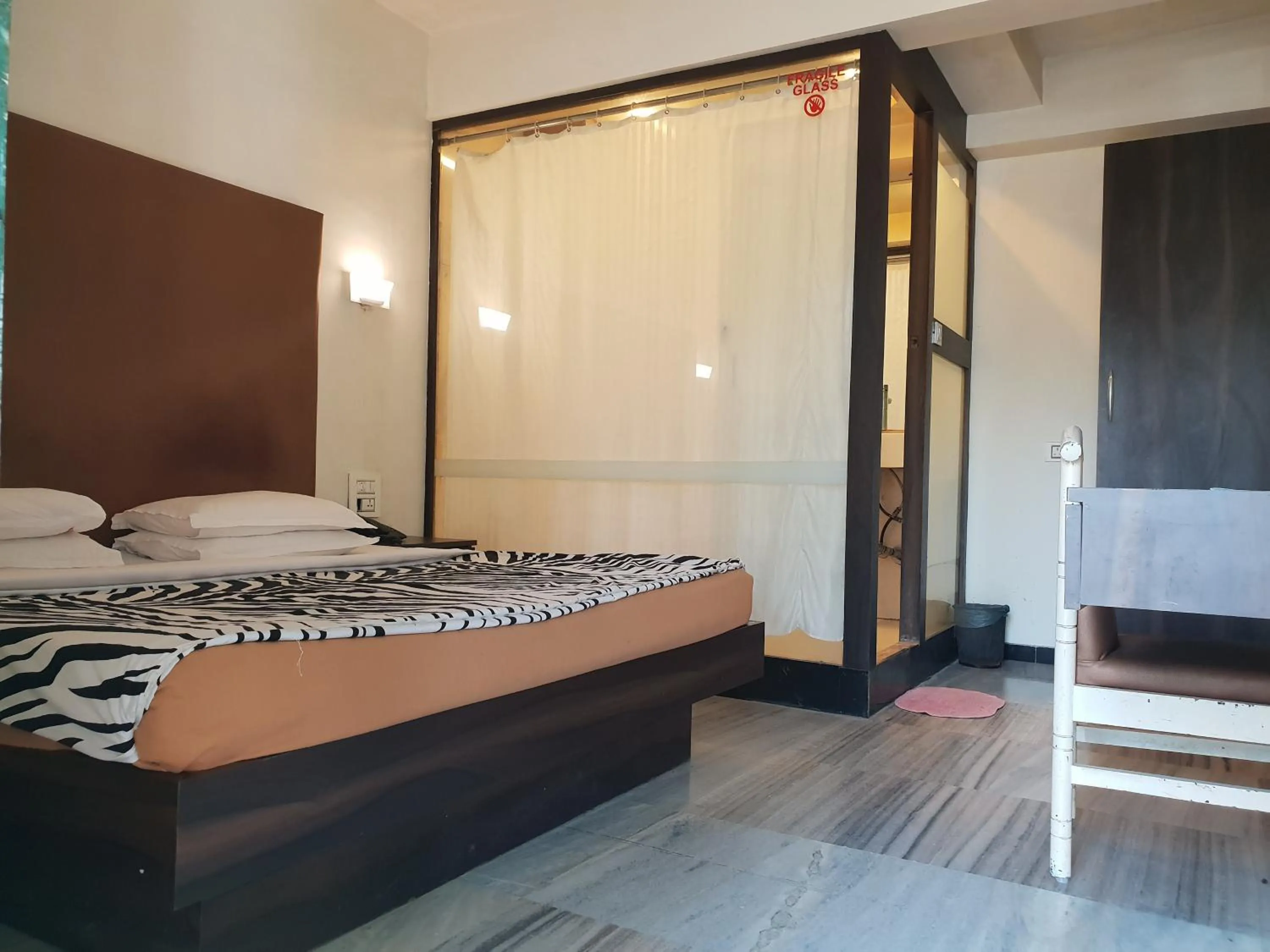 Bed in Hotel Milan International