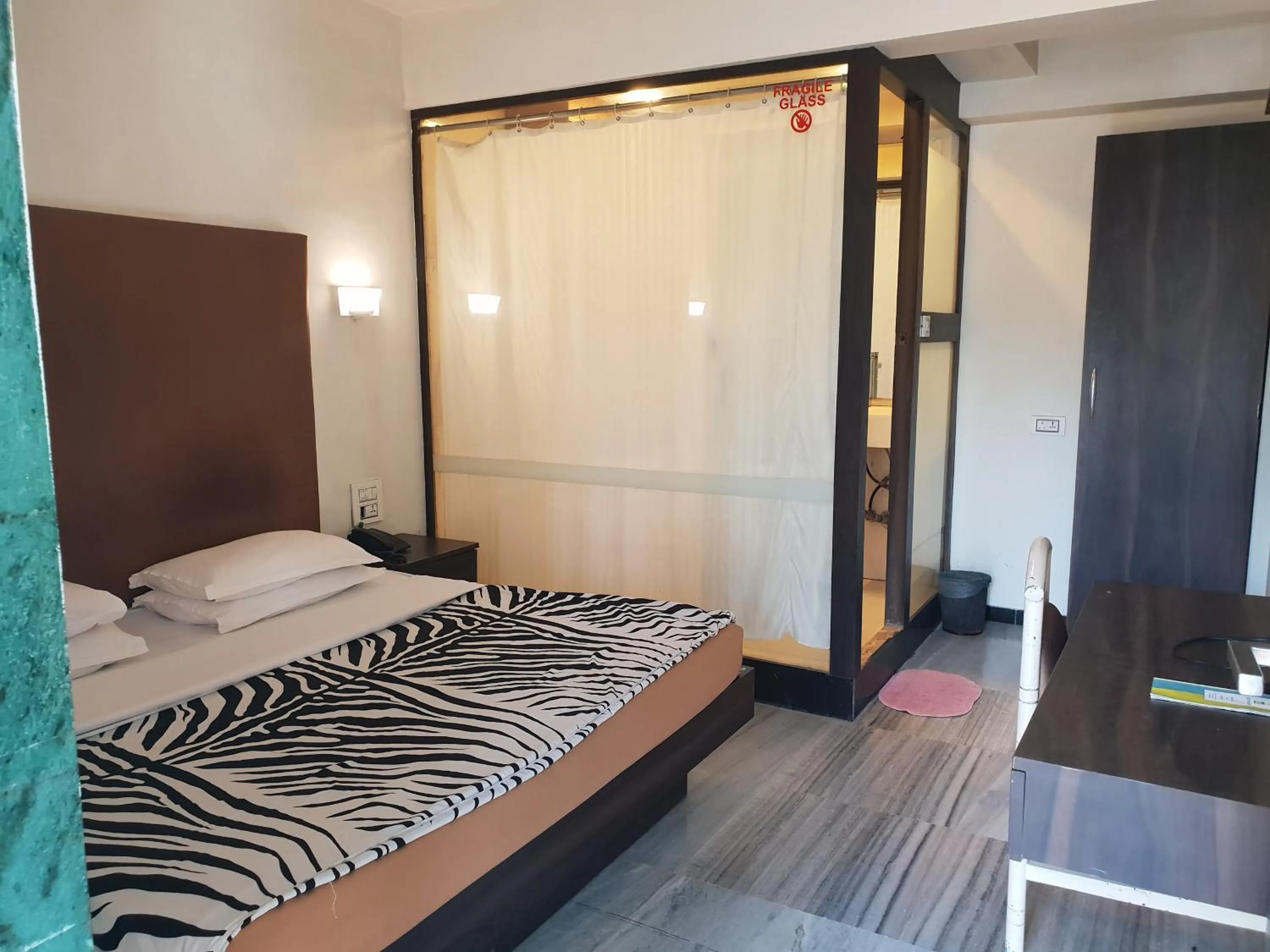 Bed in Hotel Milan International