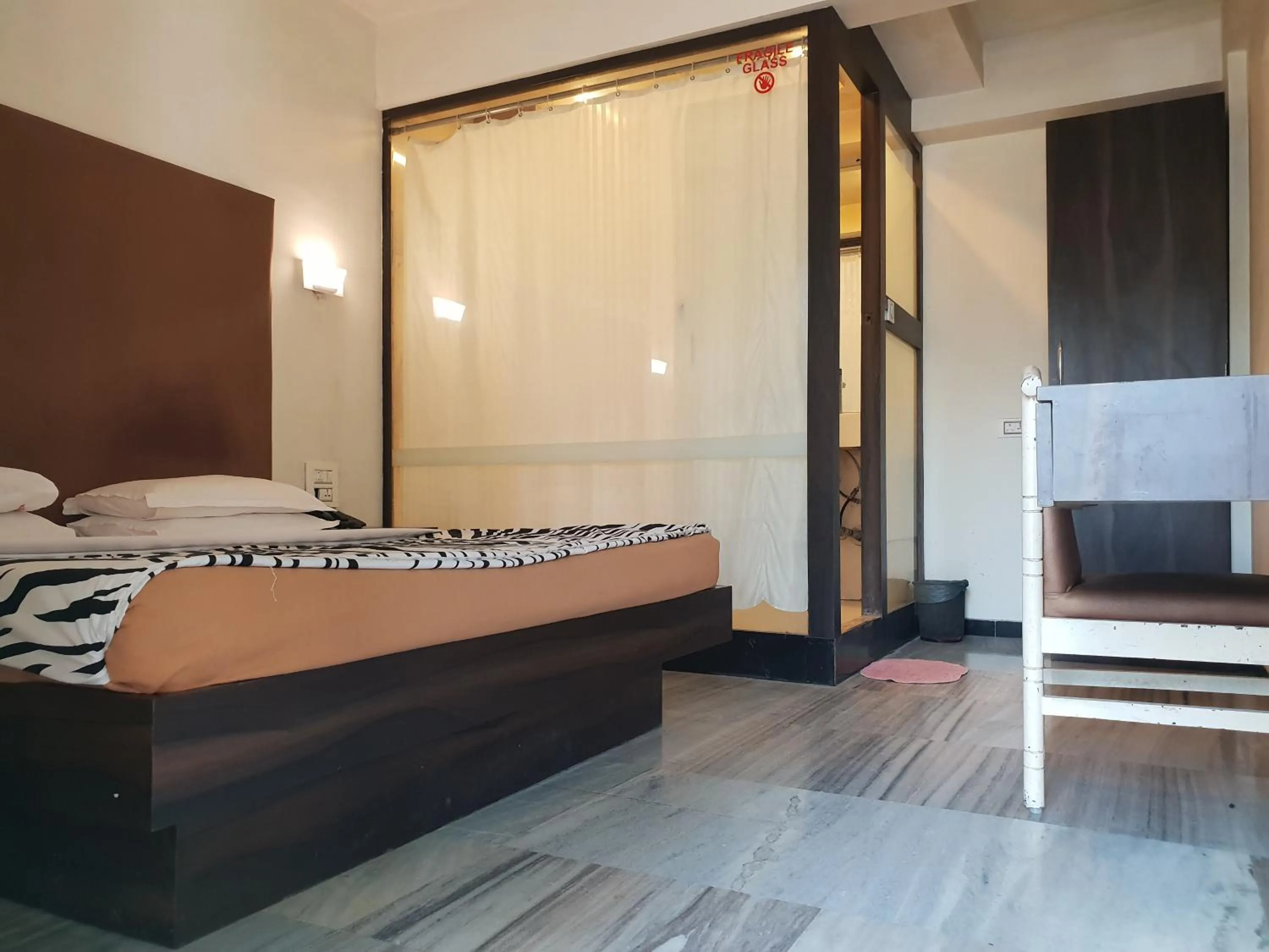 Bed in Hotel Milan International