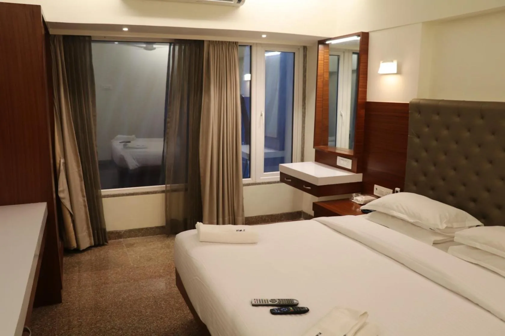 Bed in Hotel Milan International