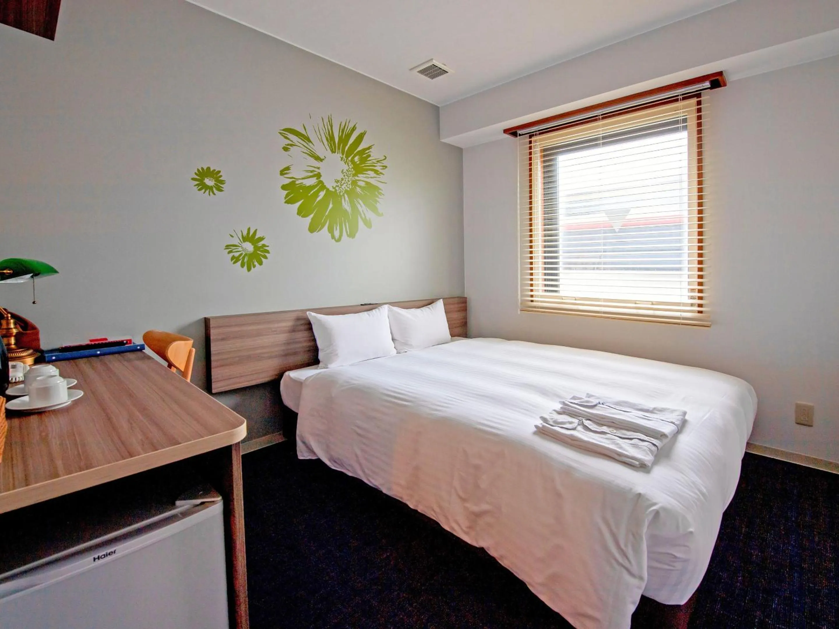 Bed in Hotel Azat Naha