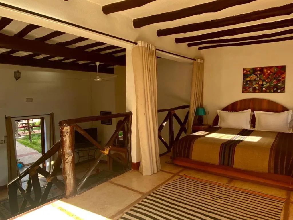 Bed in Relais Esmeralda