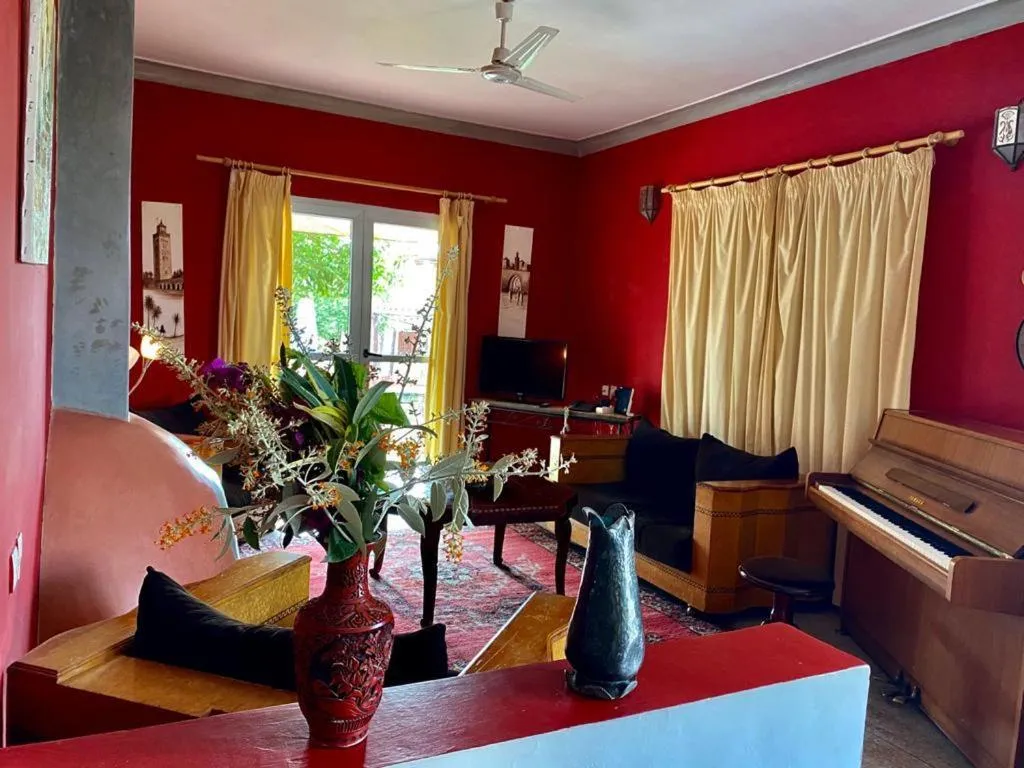 Communal lounge/ TV room in Relais Esmeralda