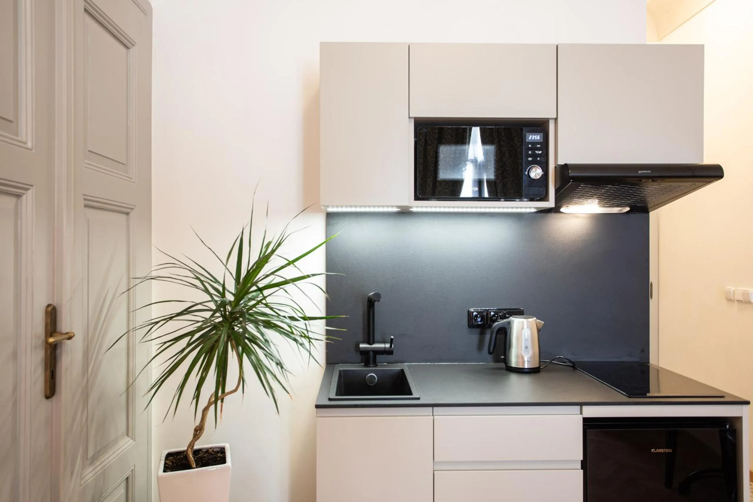 Kitchen or kitchenette in Residence Thunovska