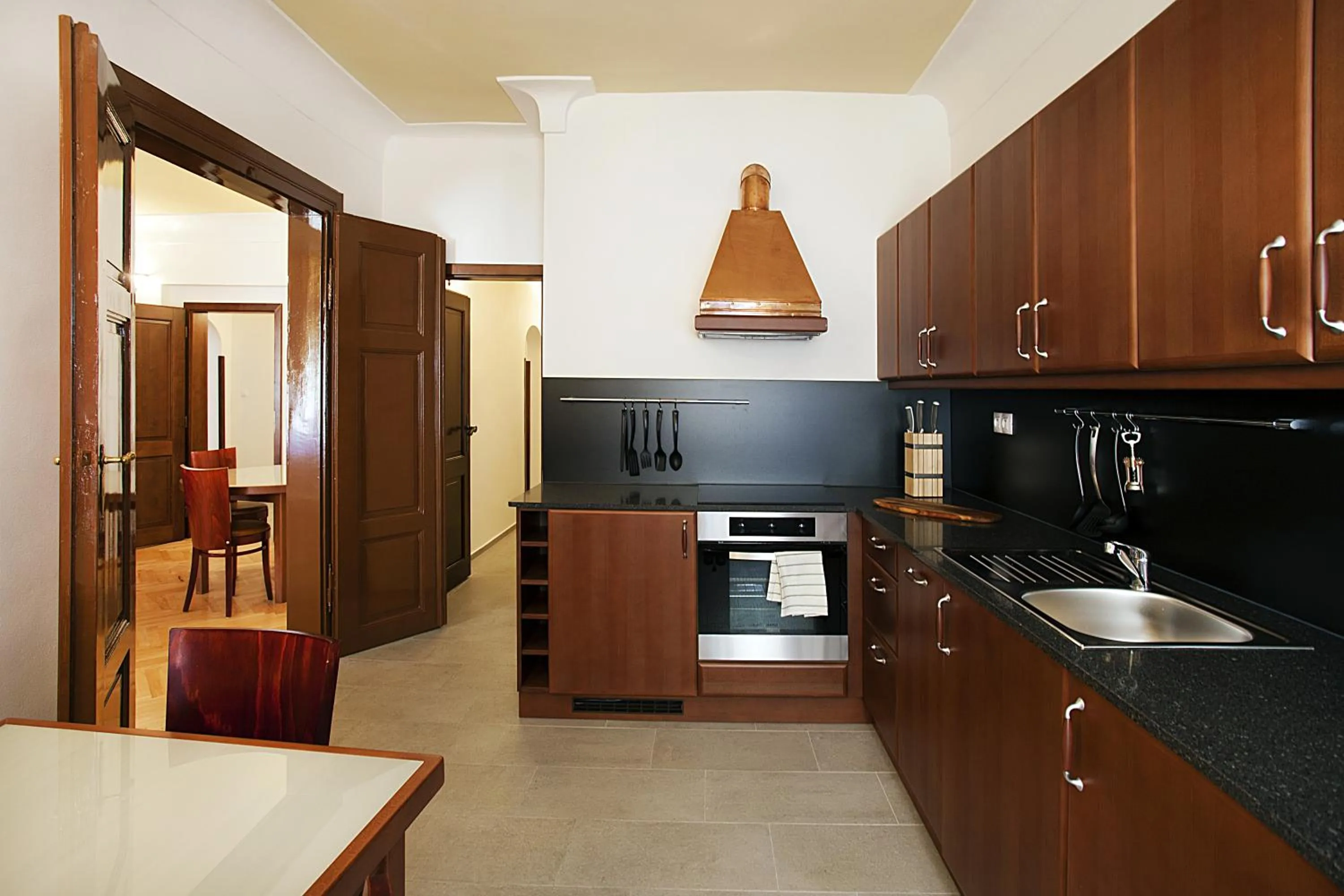 Kitchen or kitchenette in Residence Thunovska