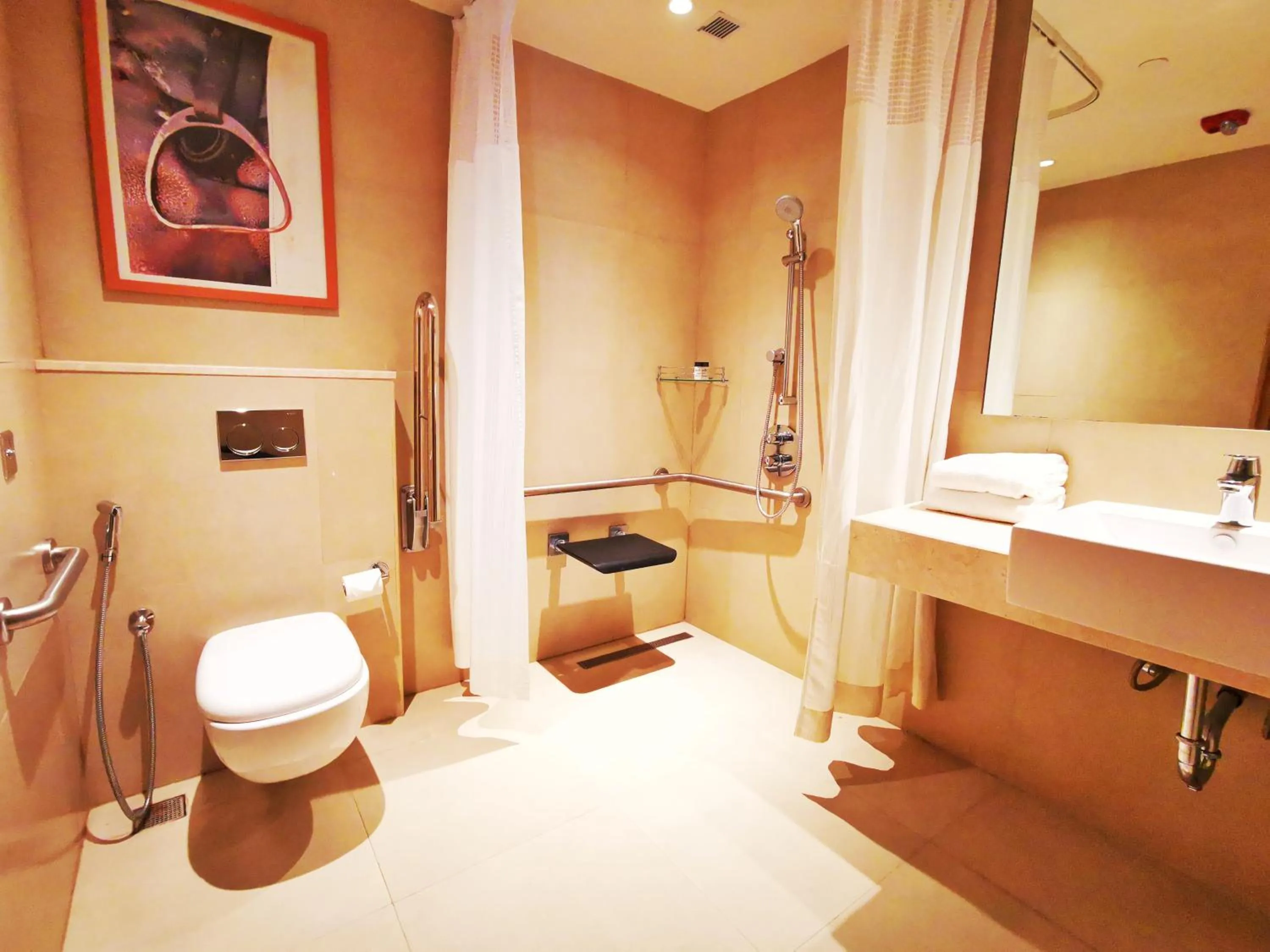 Bathroom in Holiday Inn Bengaluru Racecourse by IHG