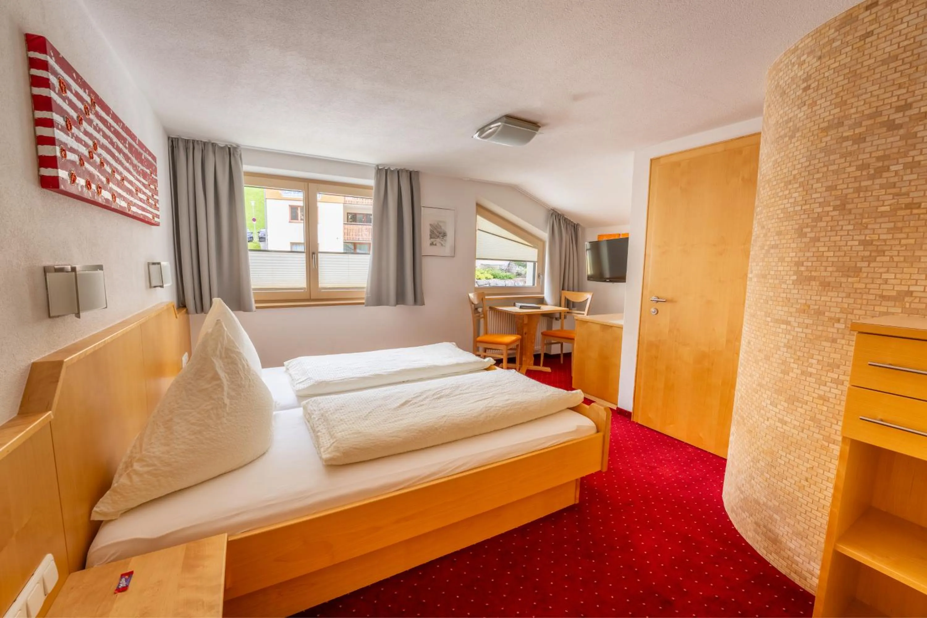Photo of the whole room, Bed in Hotel Garni Krumbach