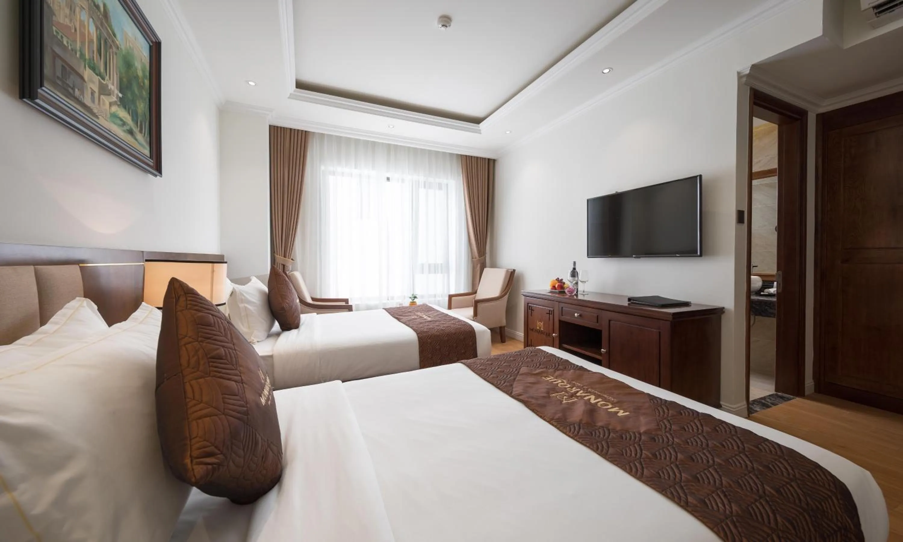 Photo of the whole room, Bed in Monarque Hotel Danang