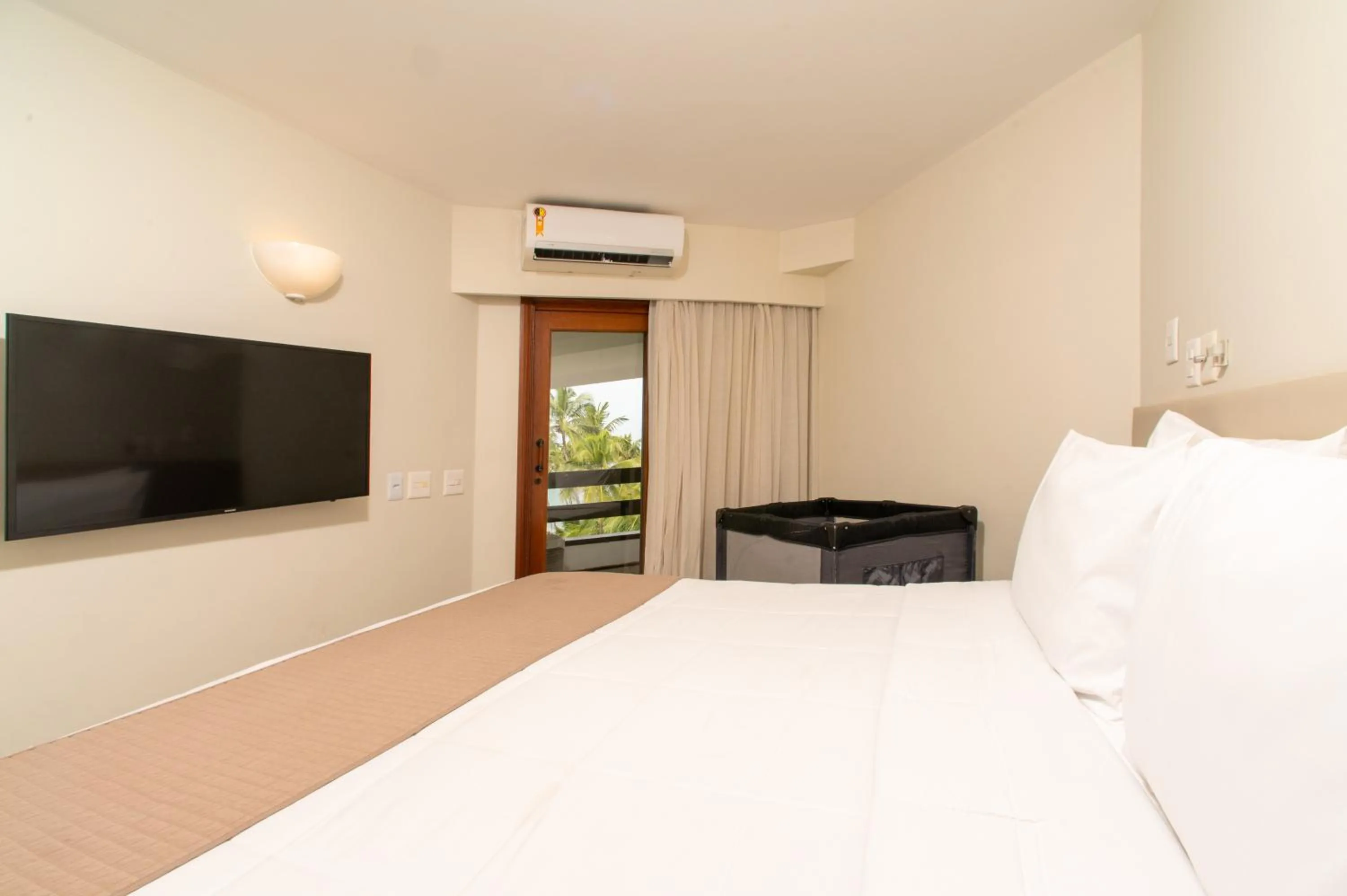 Bed in Jatiúca Suites Resort by Slaviero Hotéis