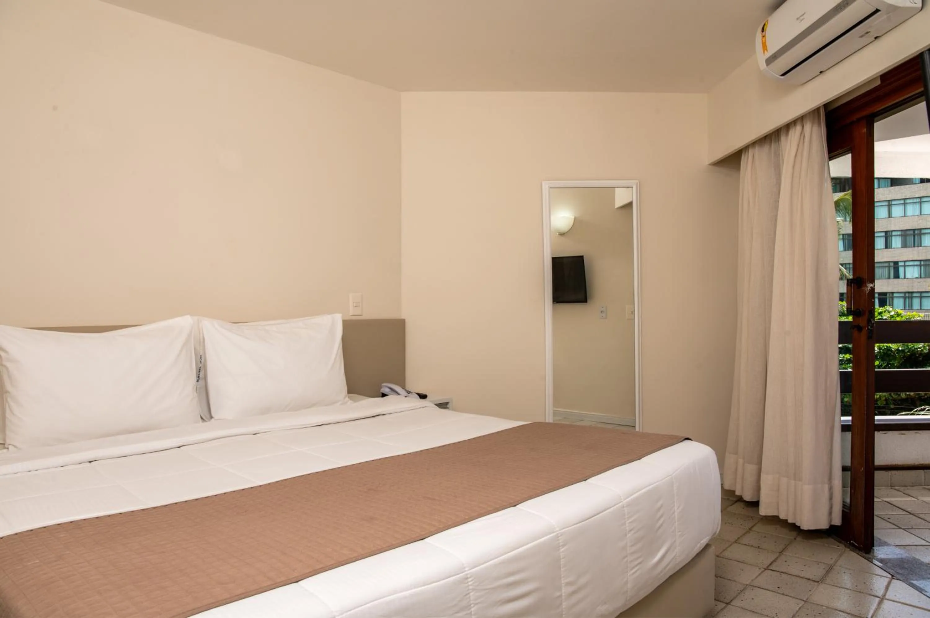 Bed in Jatiúca Suites Resort by Slaviero Hotéis