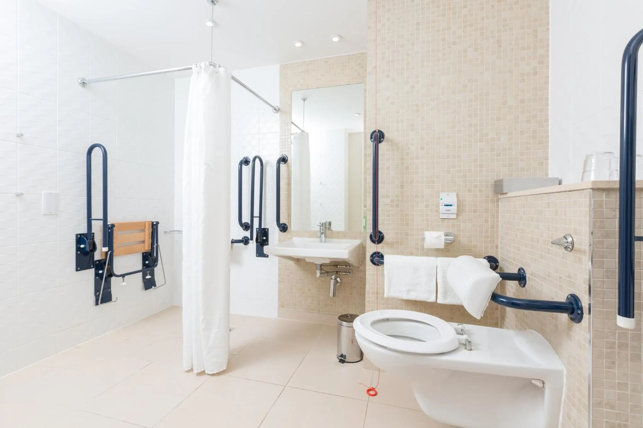 Bathroom in Holiday Inn Manchester-Mediacityuk by IHG