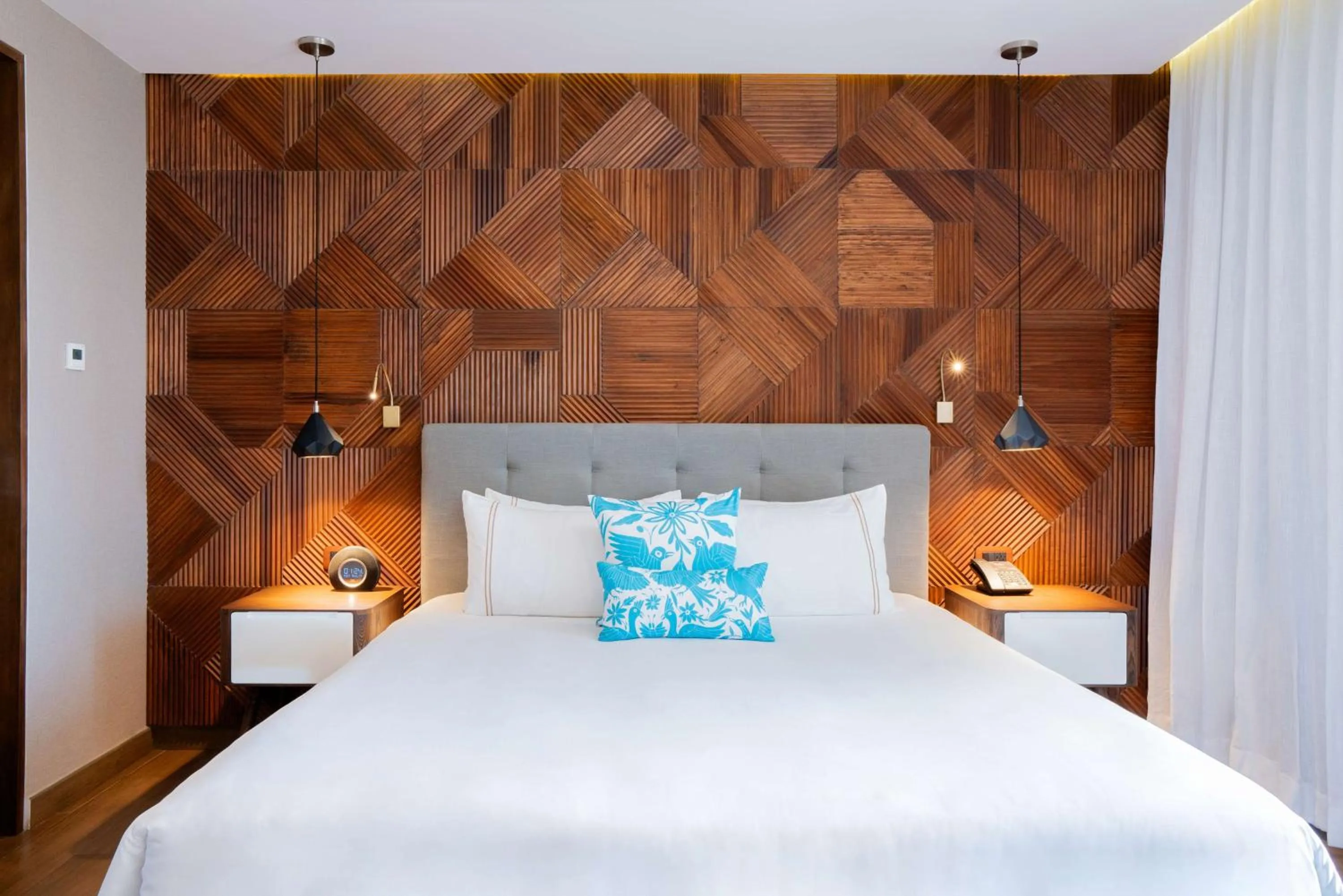 Bed in The Fives Downtown Hotel & Residences, Curio Collection by Hilton