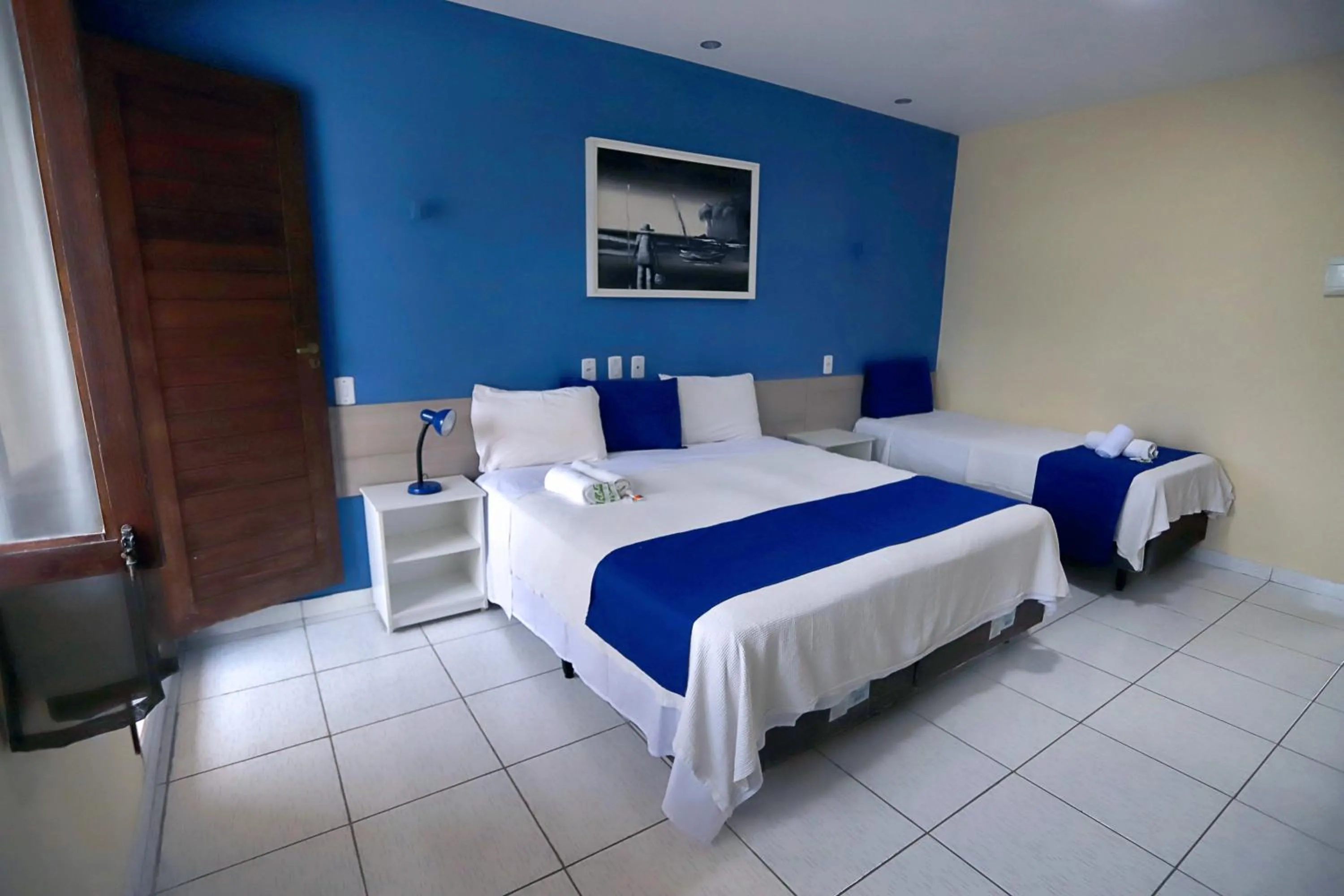 Bed in Pousada Costera