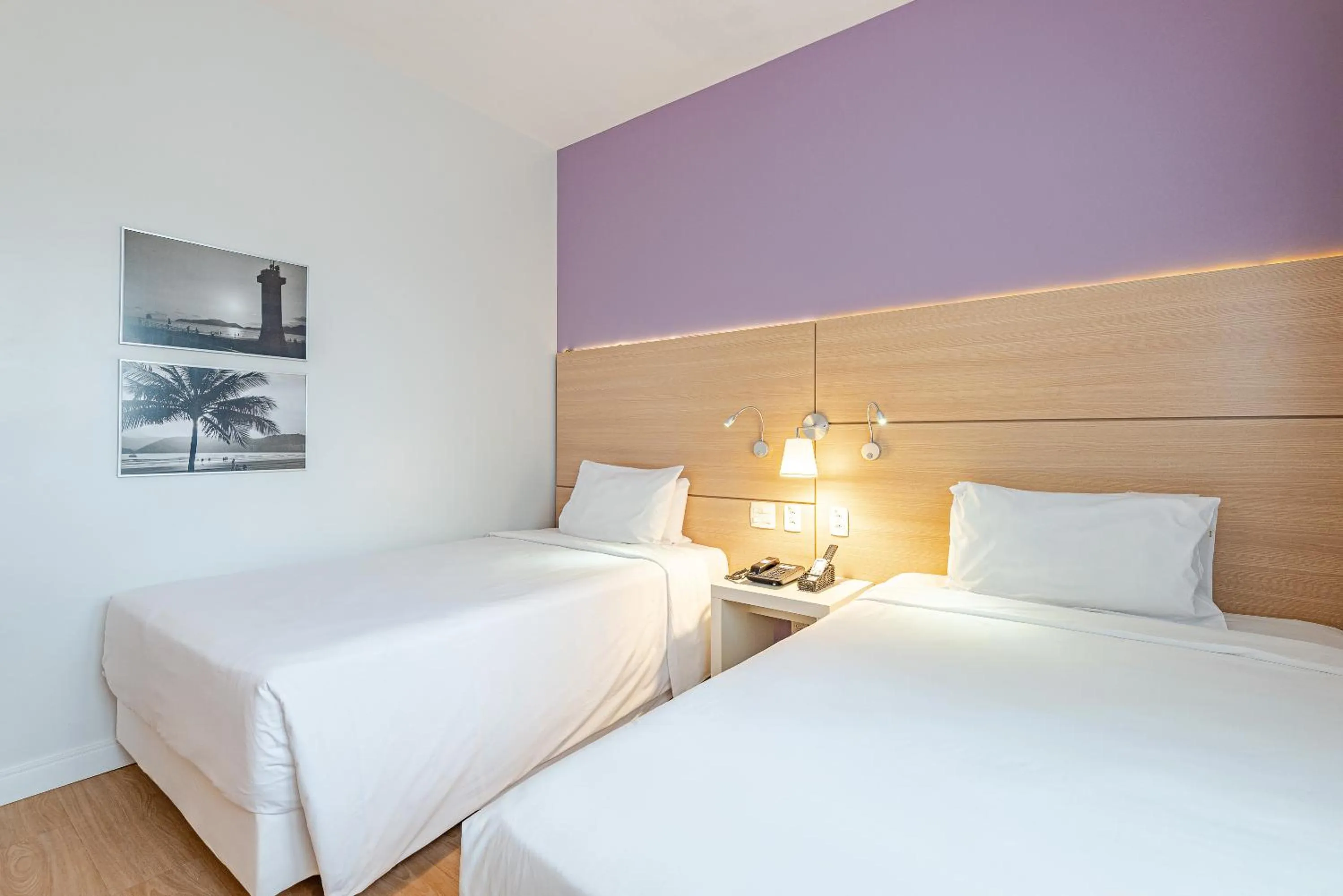 Bed in Roomo Transamerica Santos Gonzaga