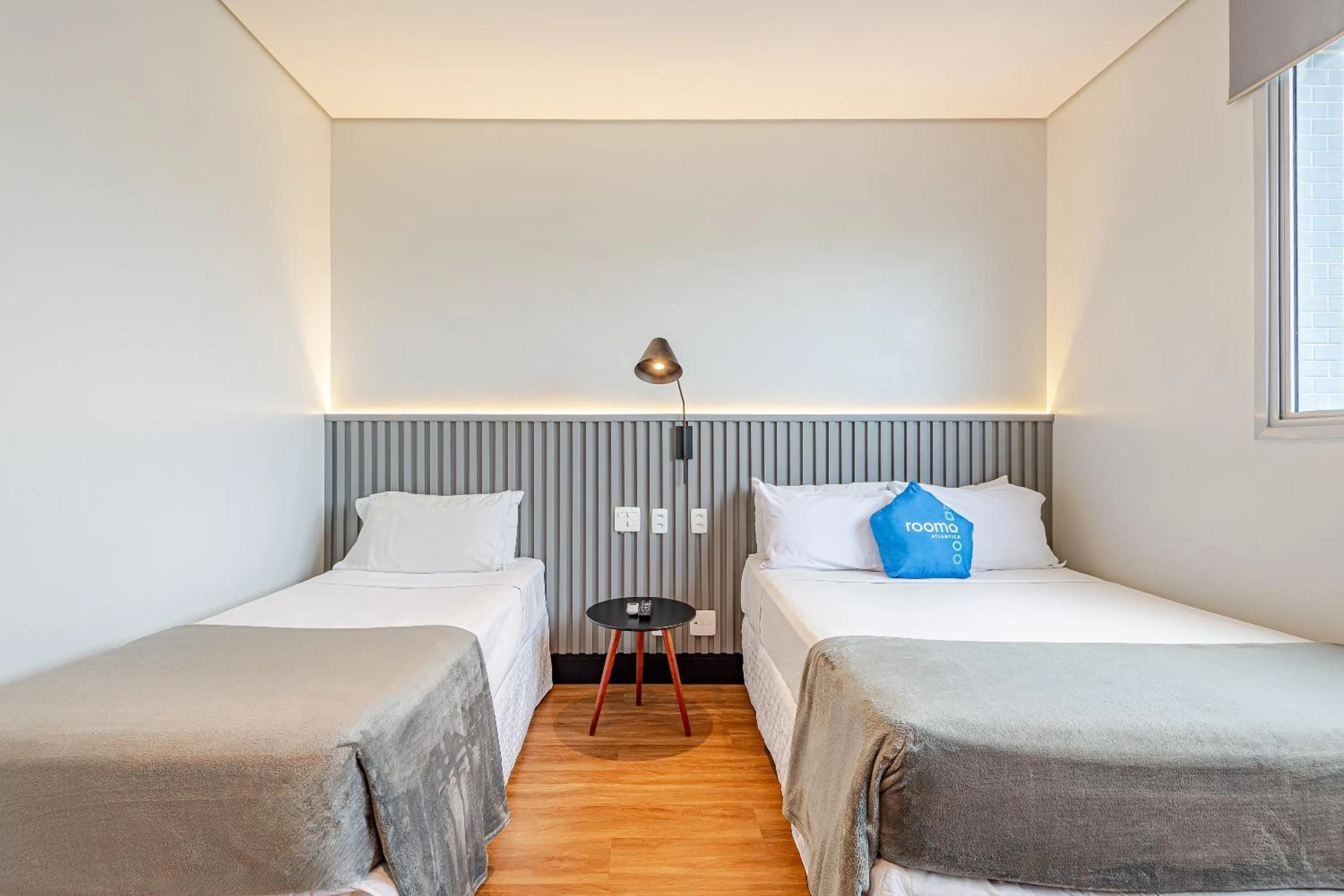 Bed in Roomo Transamerica Santos Gonzaga