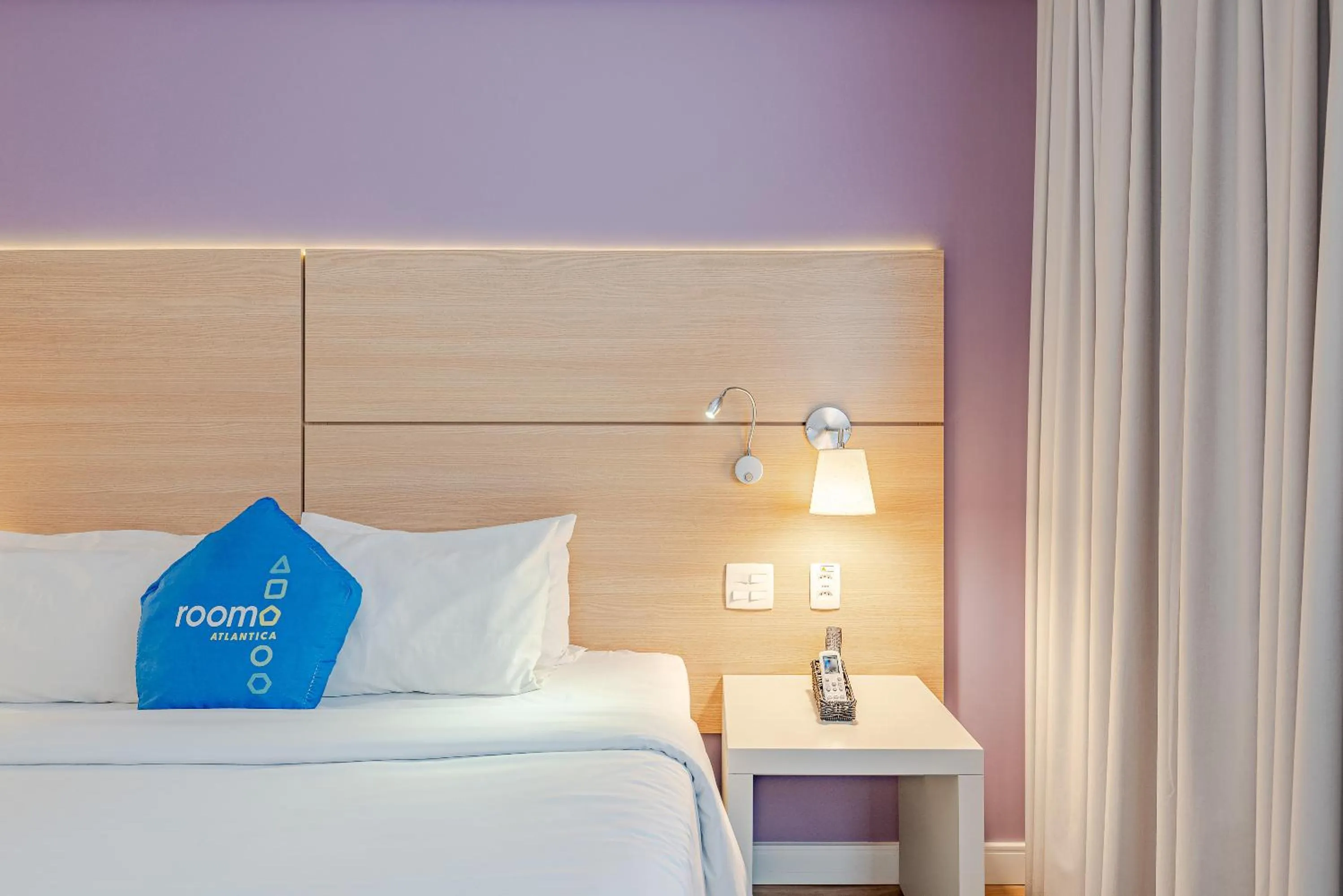 Bed in Roomo Transamerica Santos Gonzaga