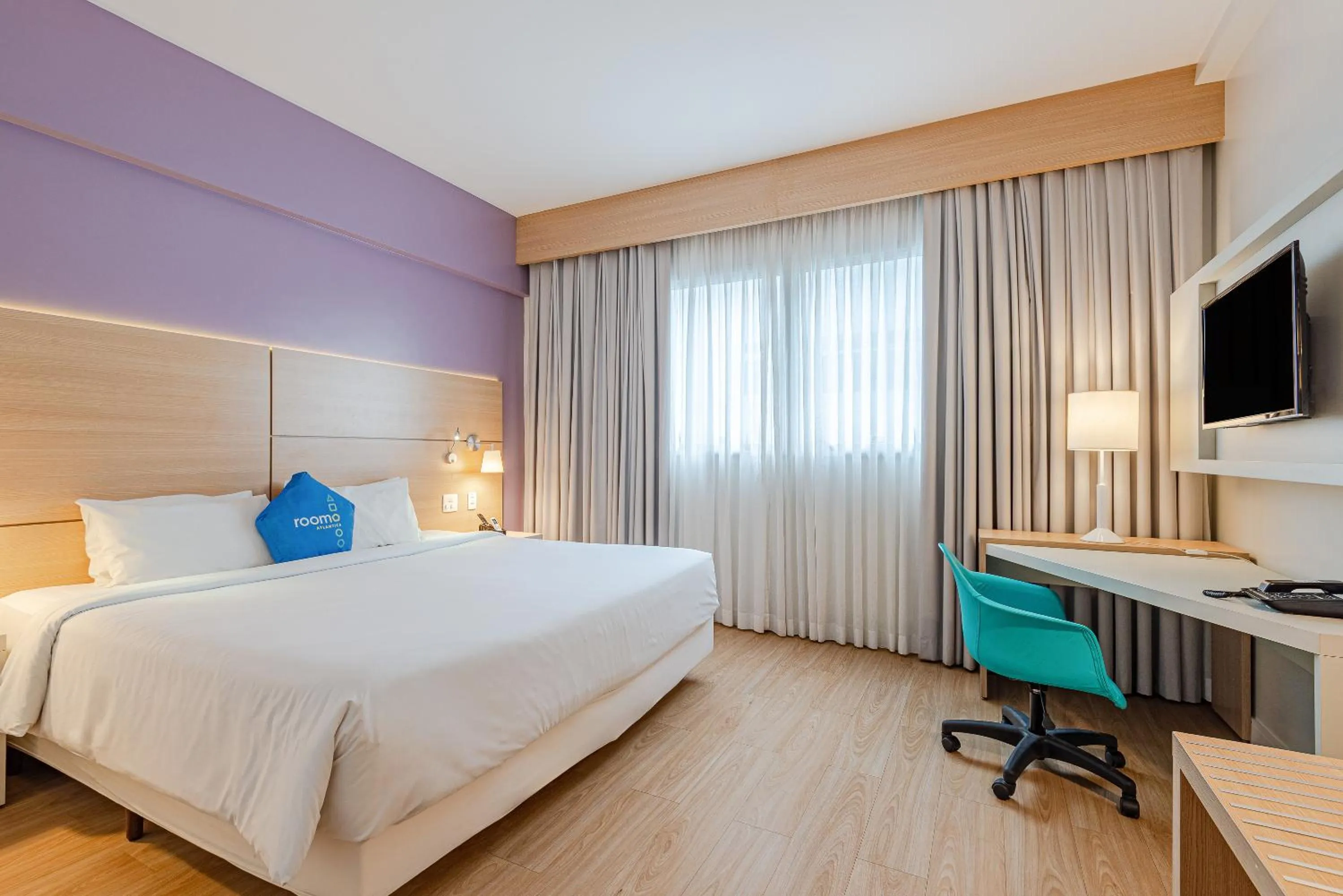 Bed in Roomo Transamerica Santos Gonzaga