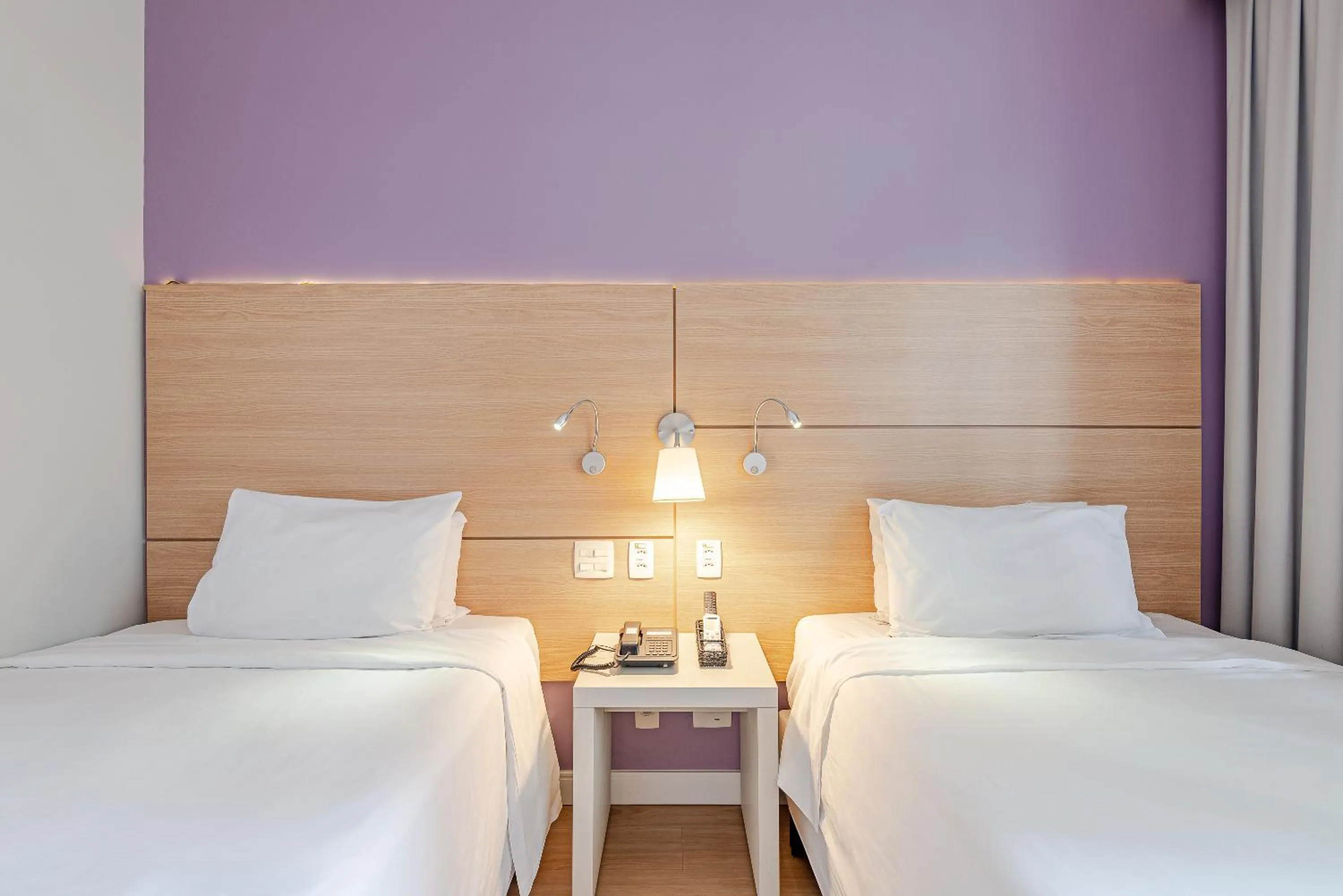 Bed in Roomo Transamerica Santos Gonzaga