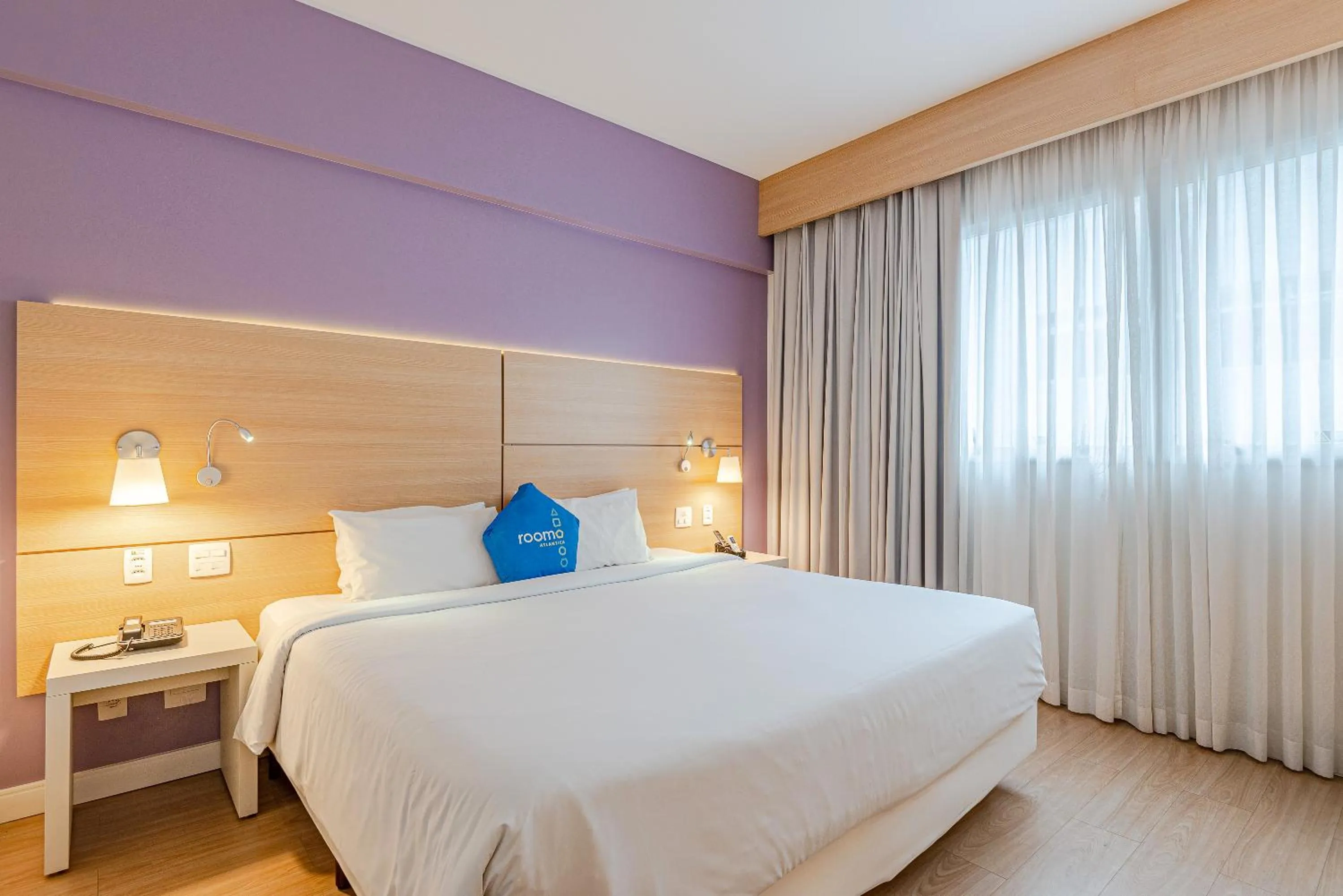 Bed in Roomo Transamerica Santos Gonzaga