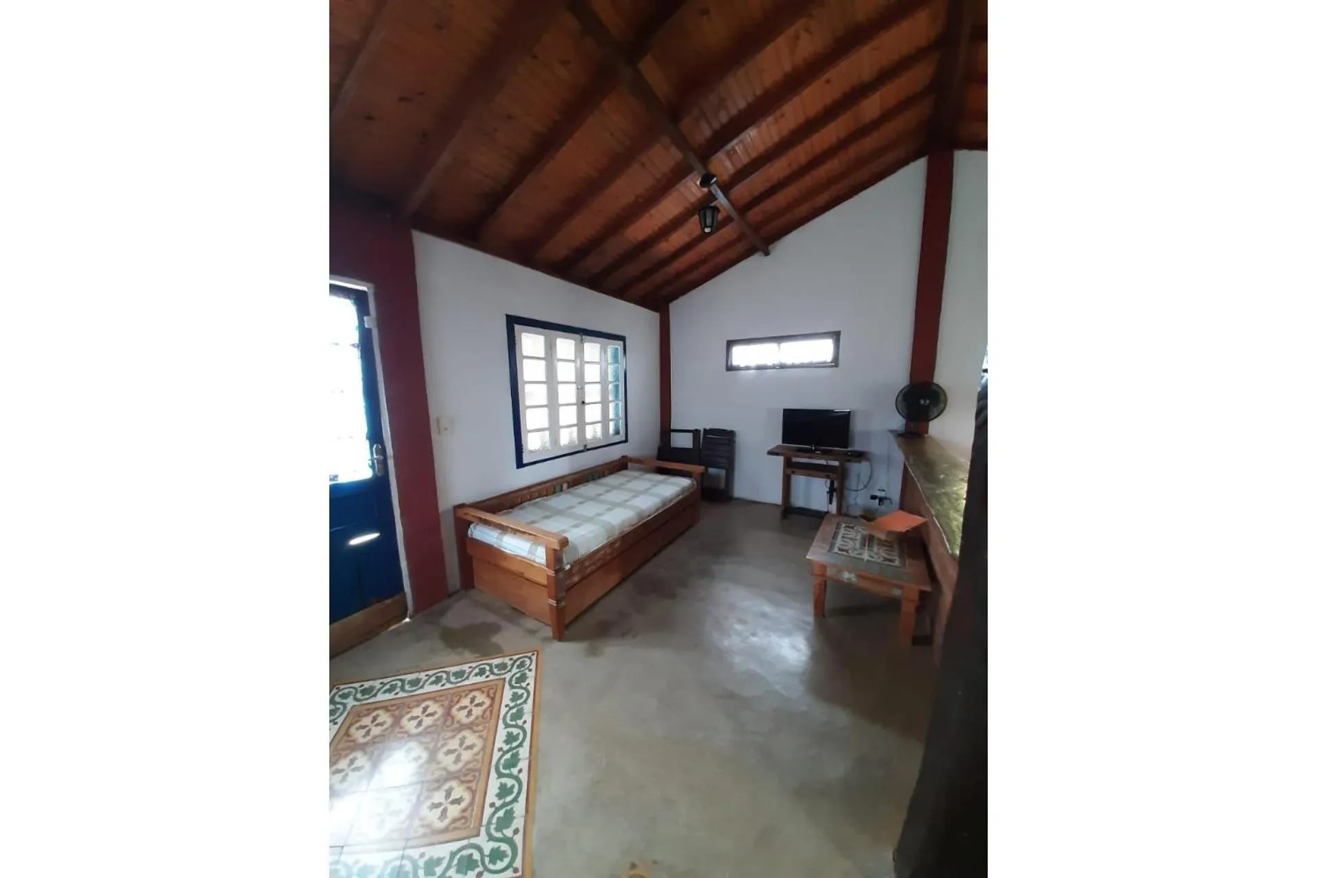 Living room, Bed in Pousada Chalé Terra Viva